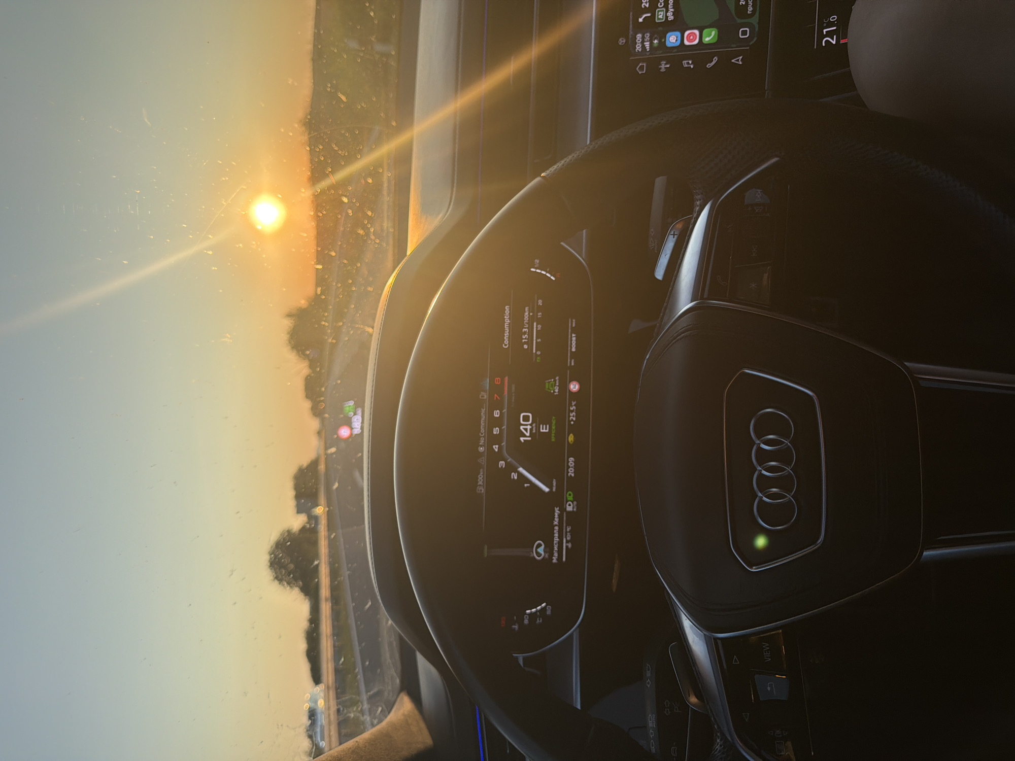 Sunset drive through rural Bulgaria, golden light across the windshield.