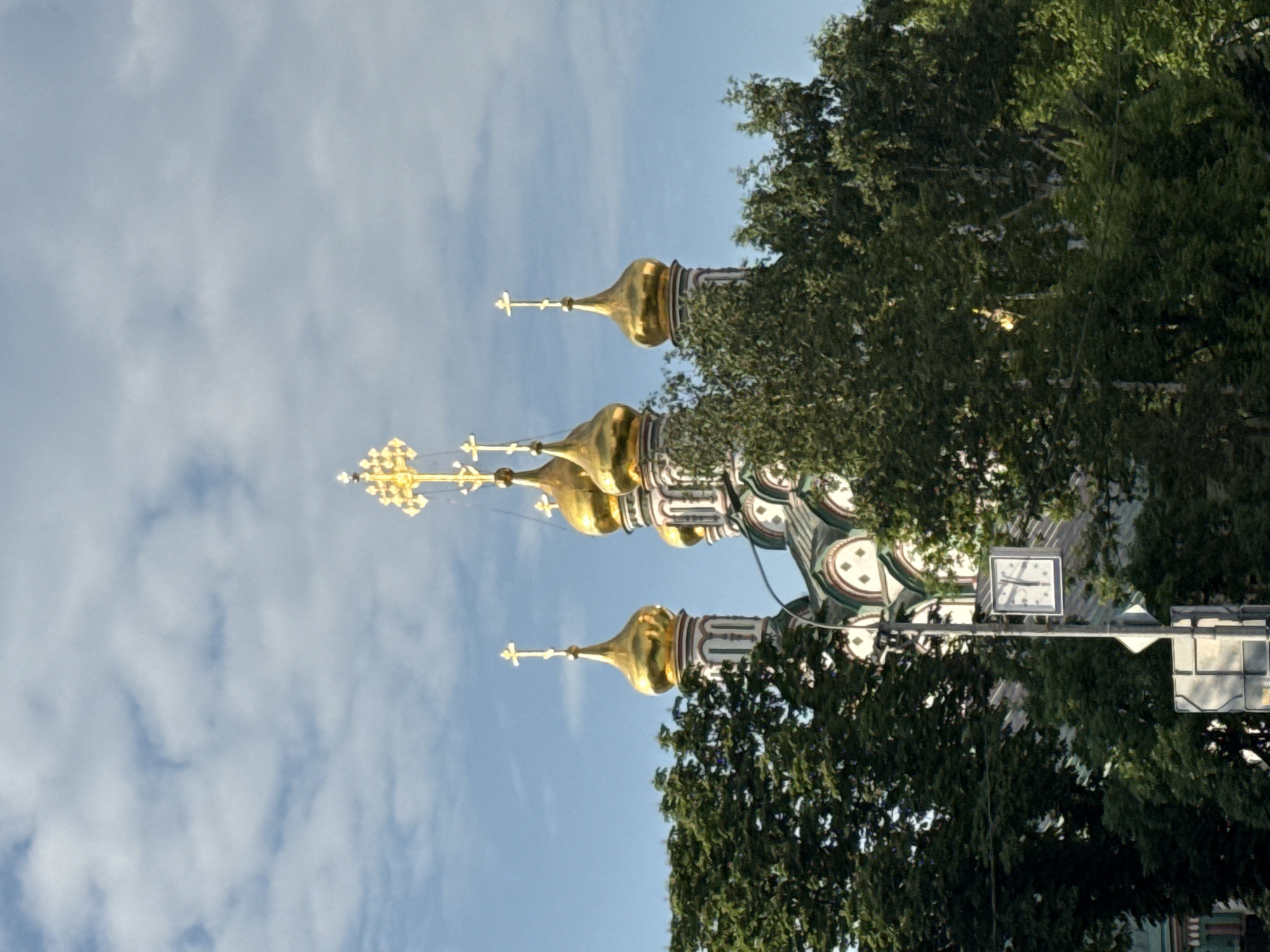 Masked figures walk near Moscow churches and retail area