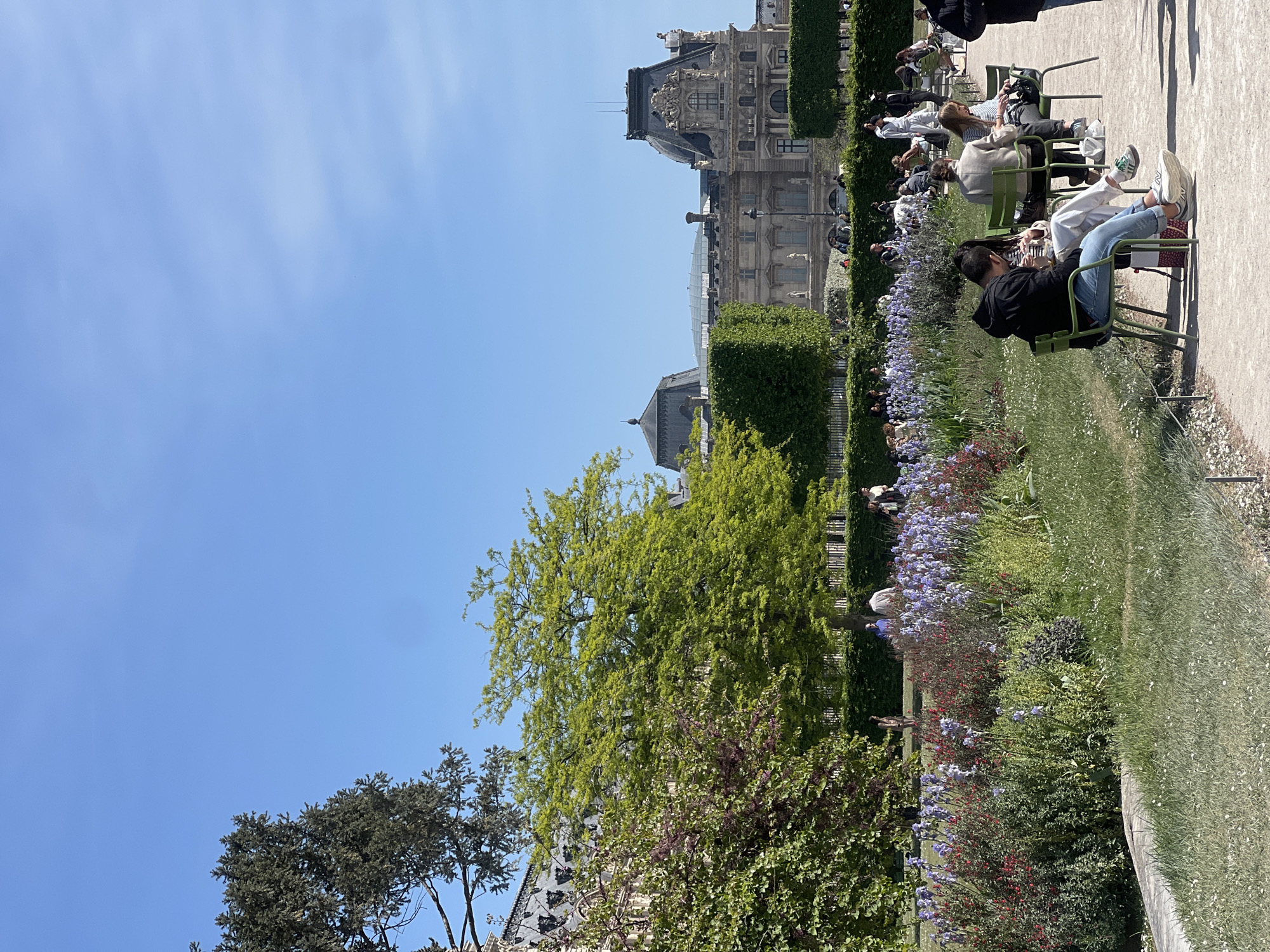 Sunny afternoon brings visitors to Paris's Tuileries Garden