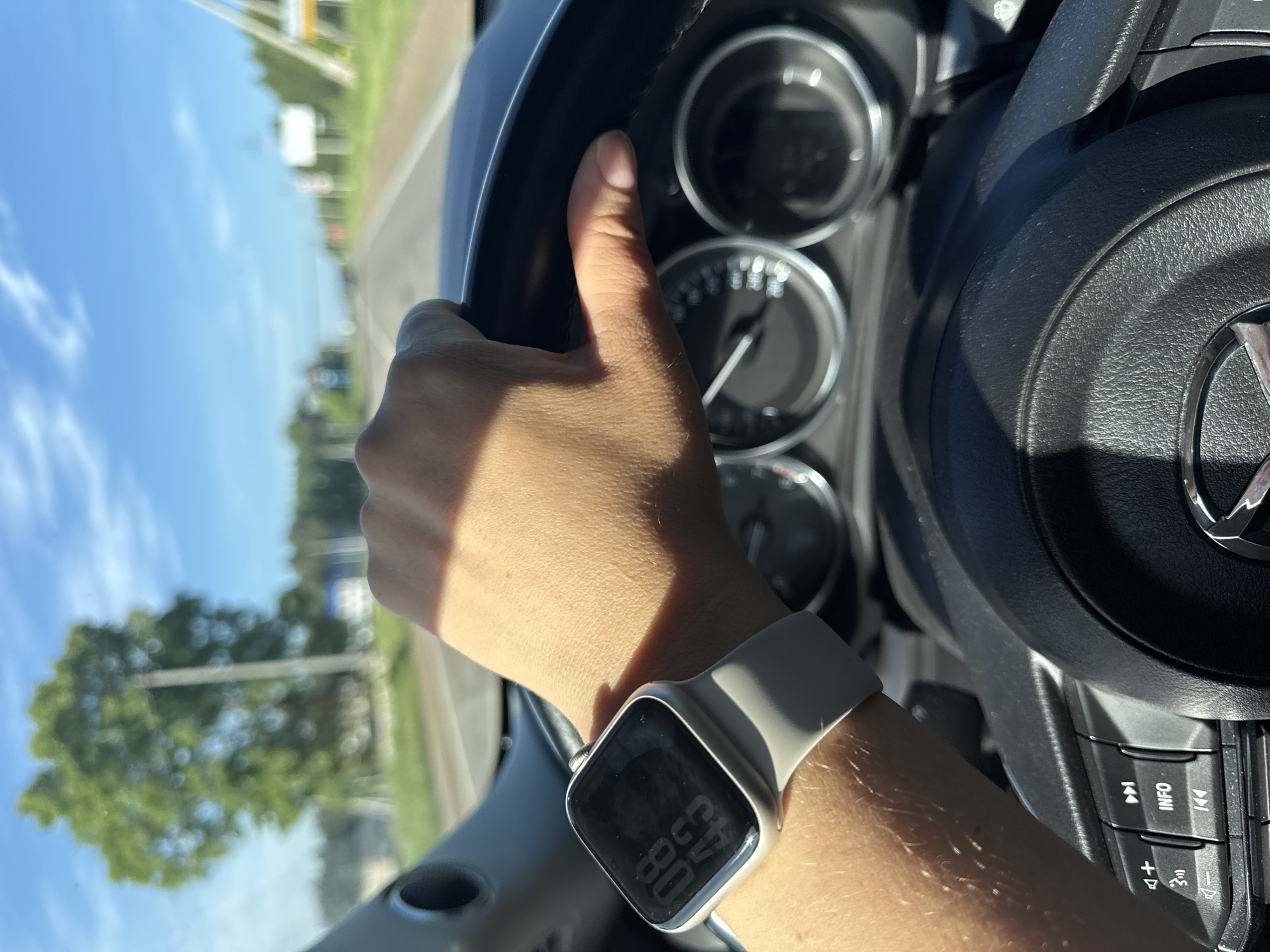 Driver photographed gripping steering wheel in Ольховка, Russia