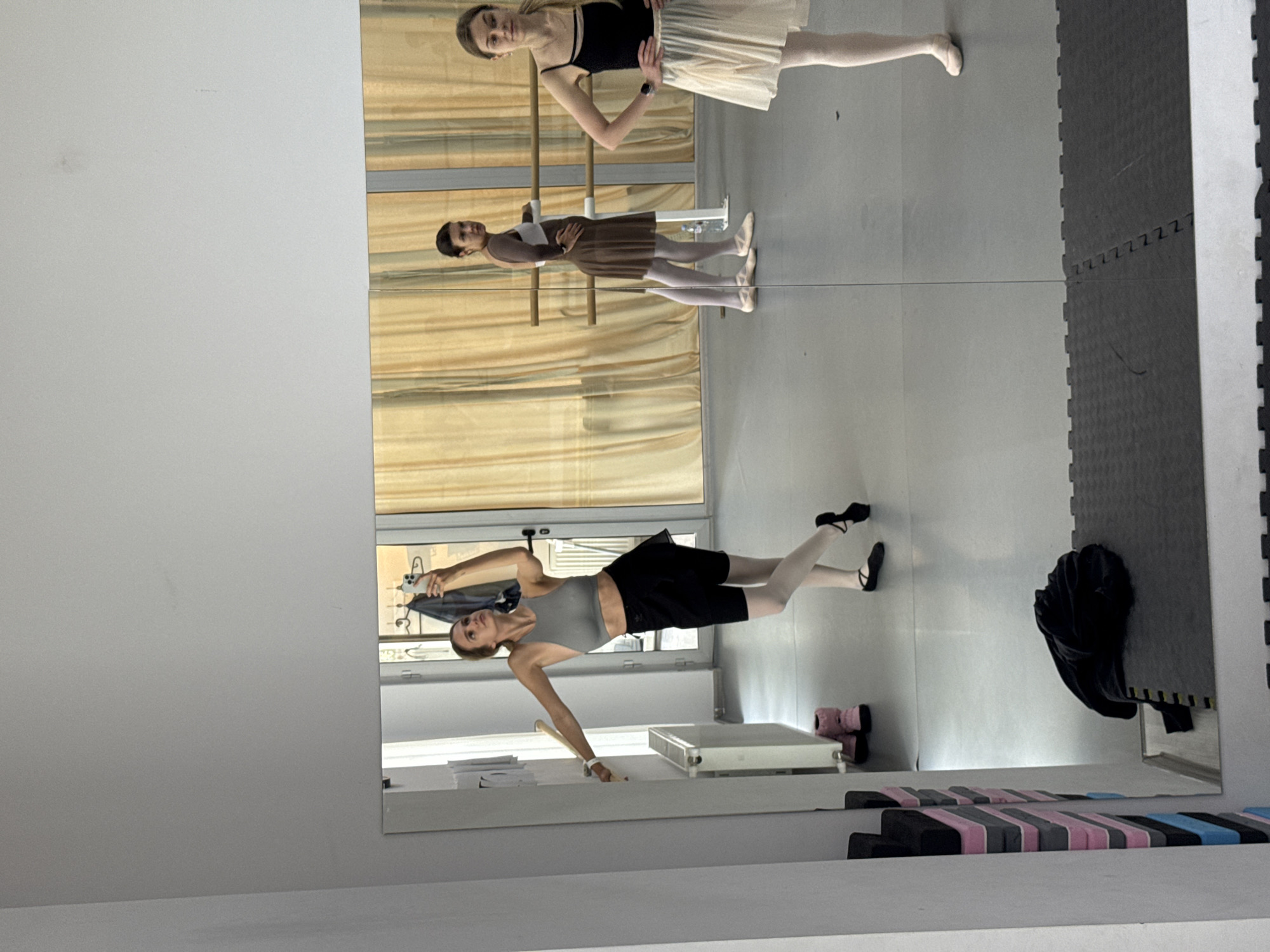 Ballet dancers practice in studio during morning session