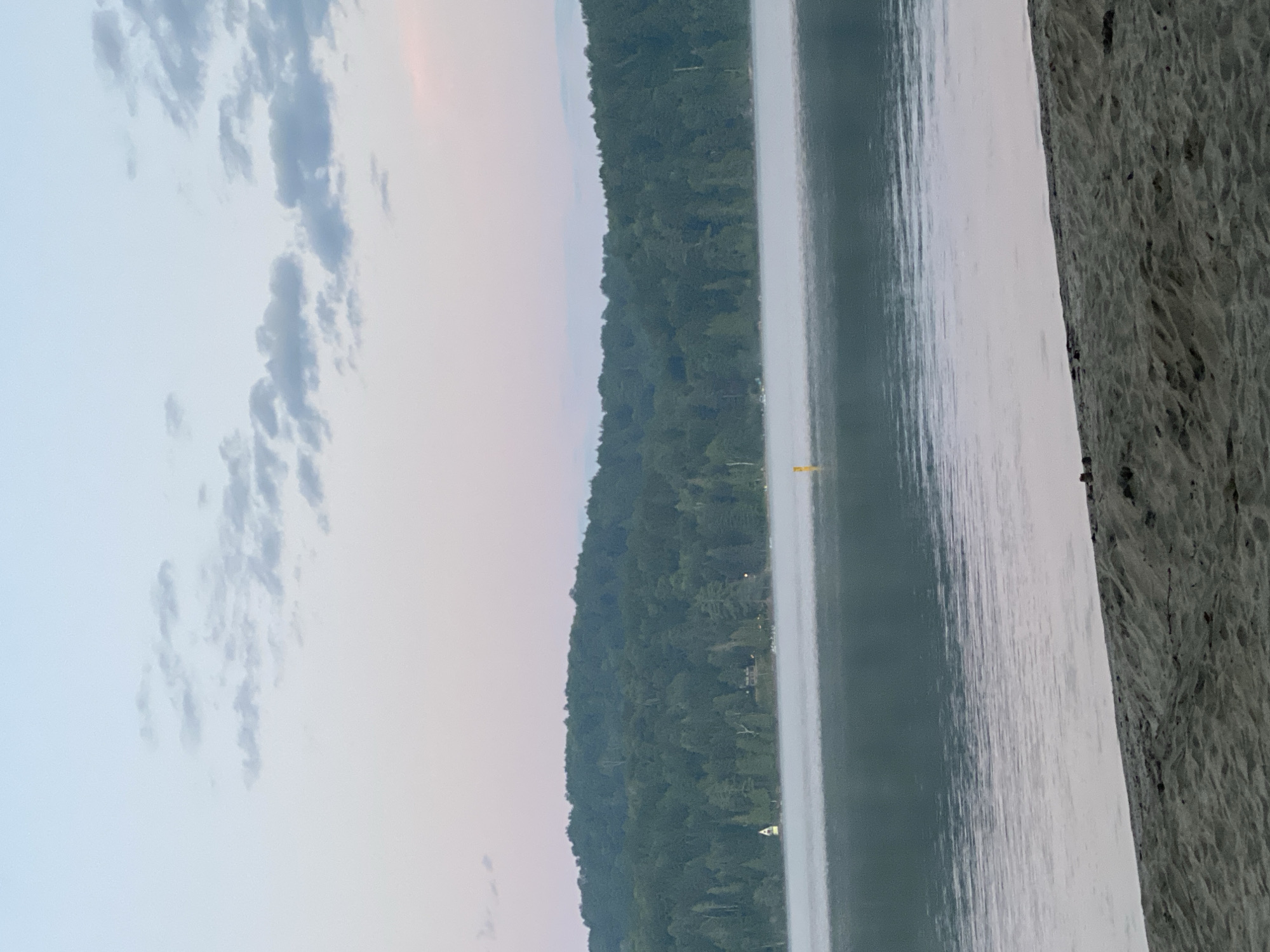 Misty dawn over a calm lake near Duhamel, Canada