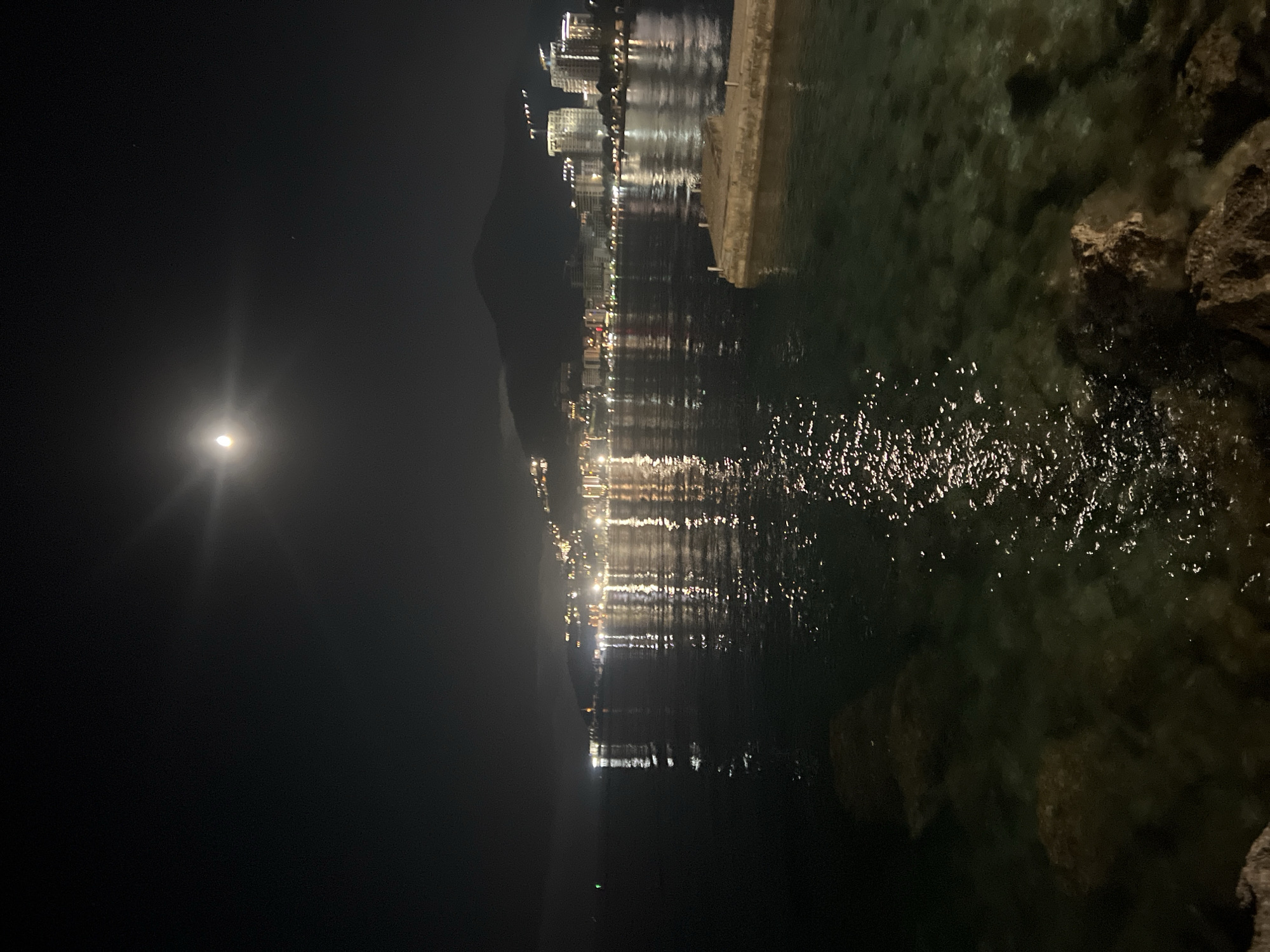 Full moon illuminates Boreti, Montenegro skyline at night