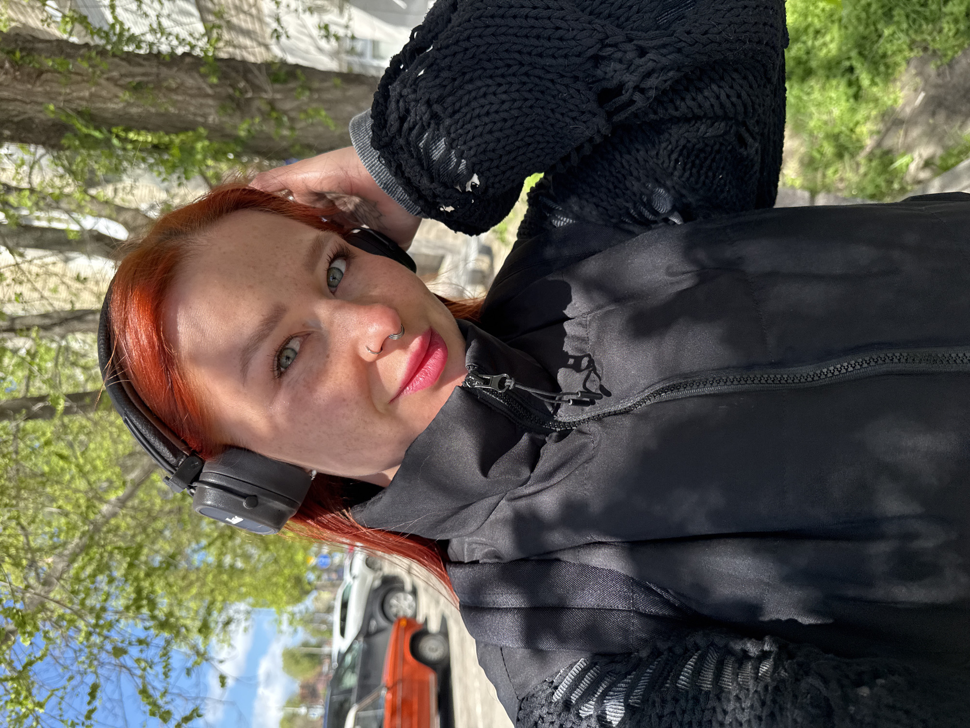 Woman documents morning walk through Rostov-on-Don with selfies, street photos