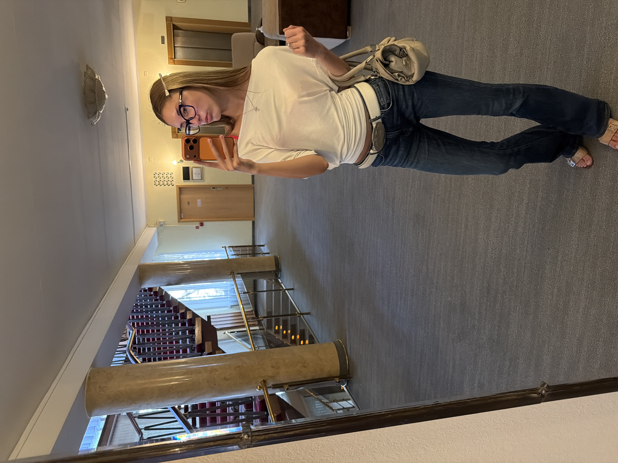 Lobby selfie, street mural, and a portrait with purple frames