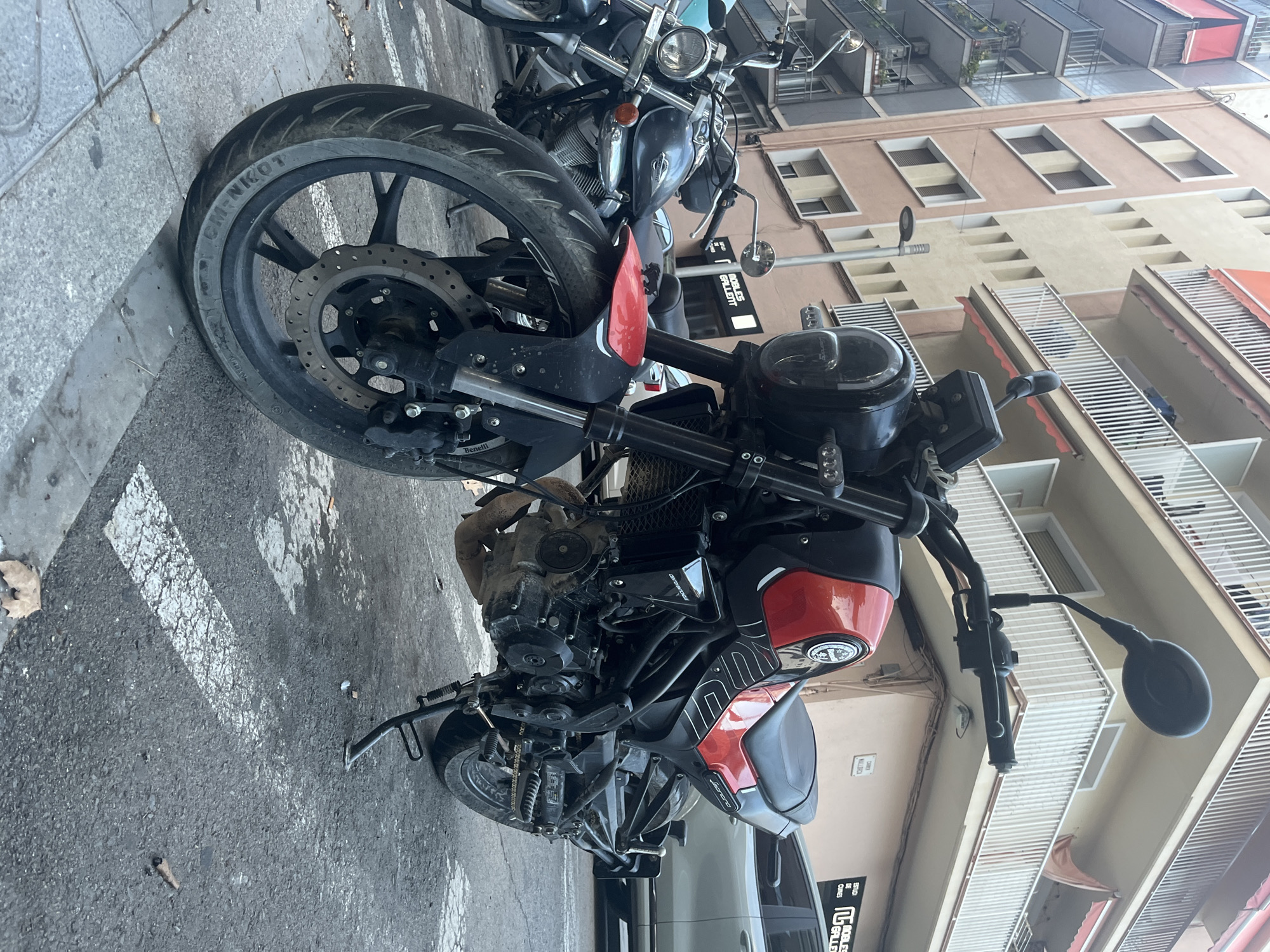 Benelli Leoncino parked on a Tarragona street, late summer evening