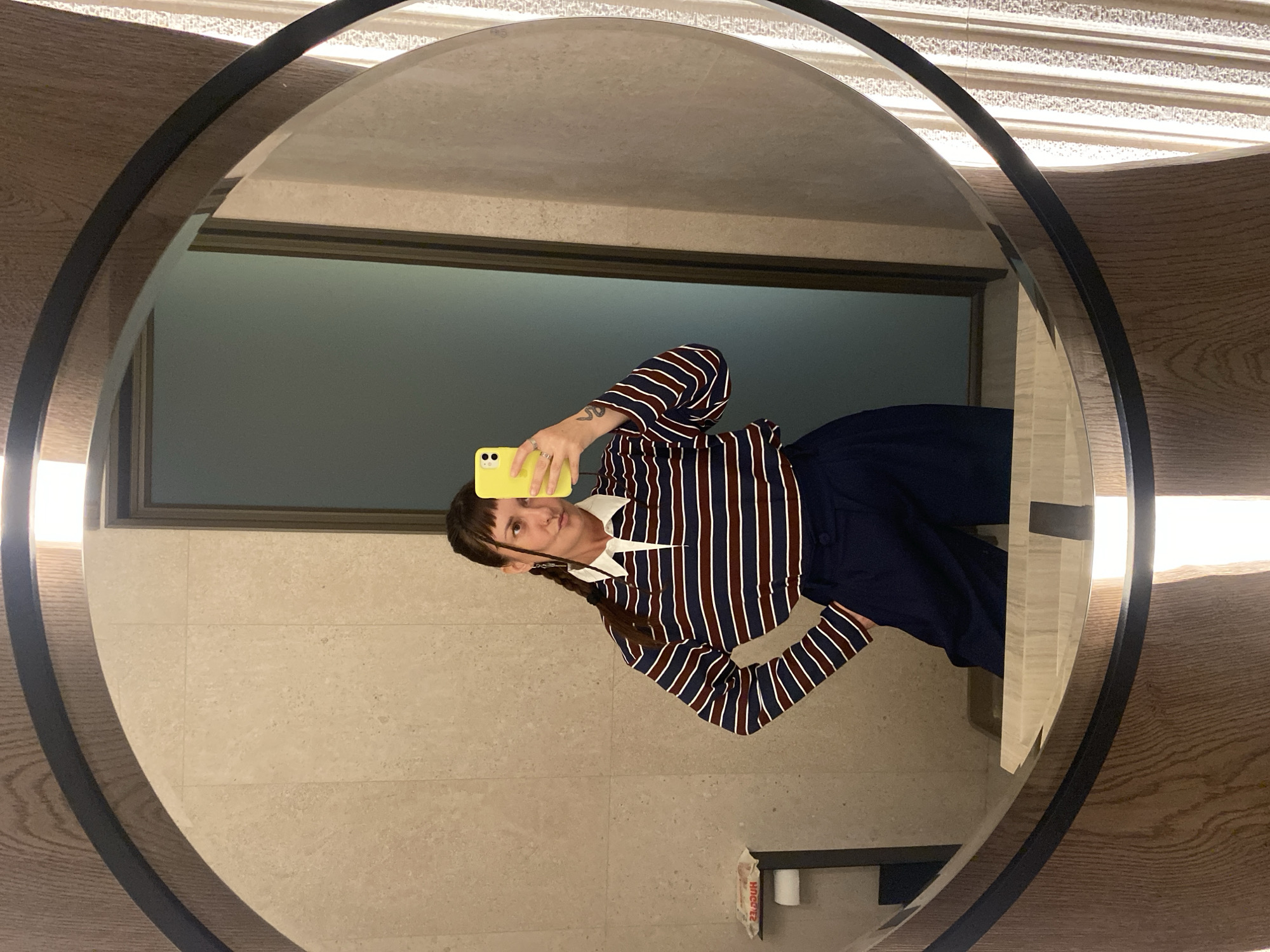 Bathroom selfies and a sushi spread on a patio in Izhevsk