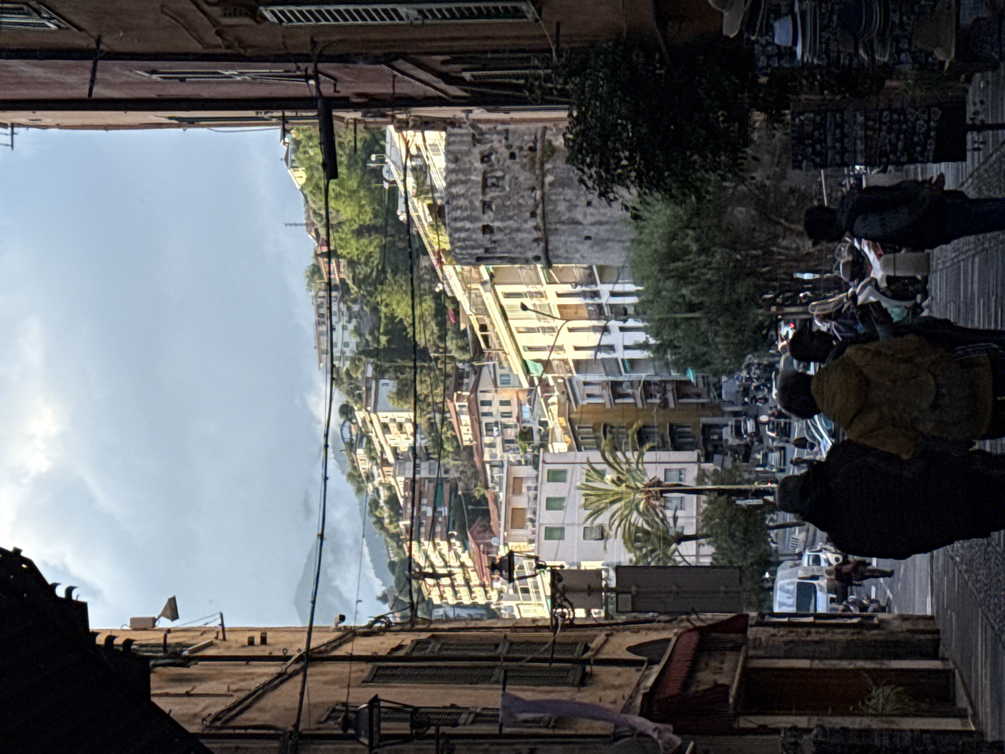 Afternoon street life documented across Sanremo, Italy neighborhoods