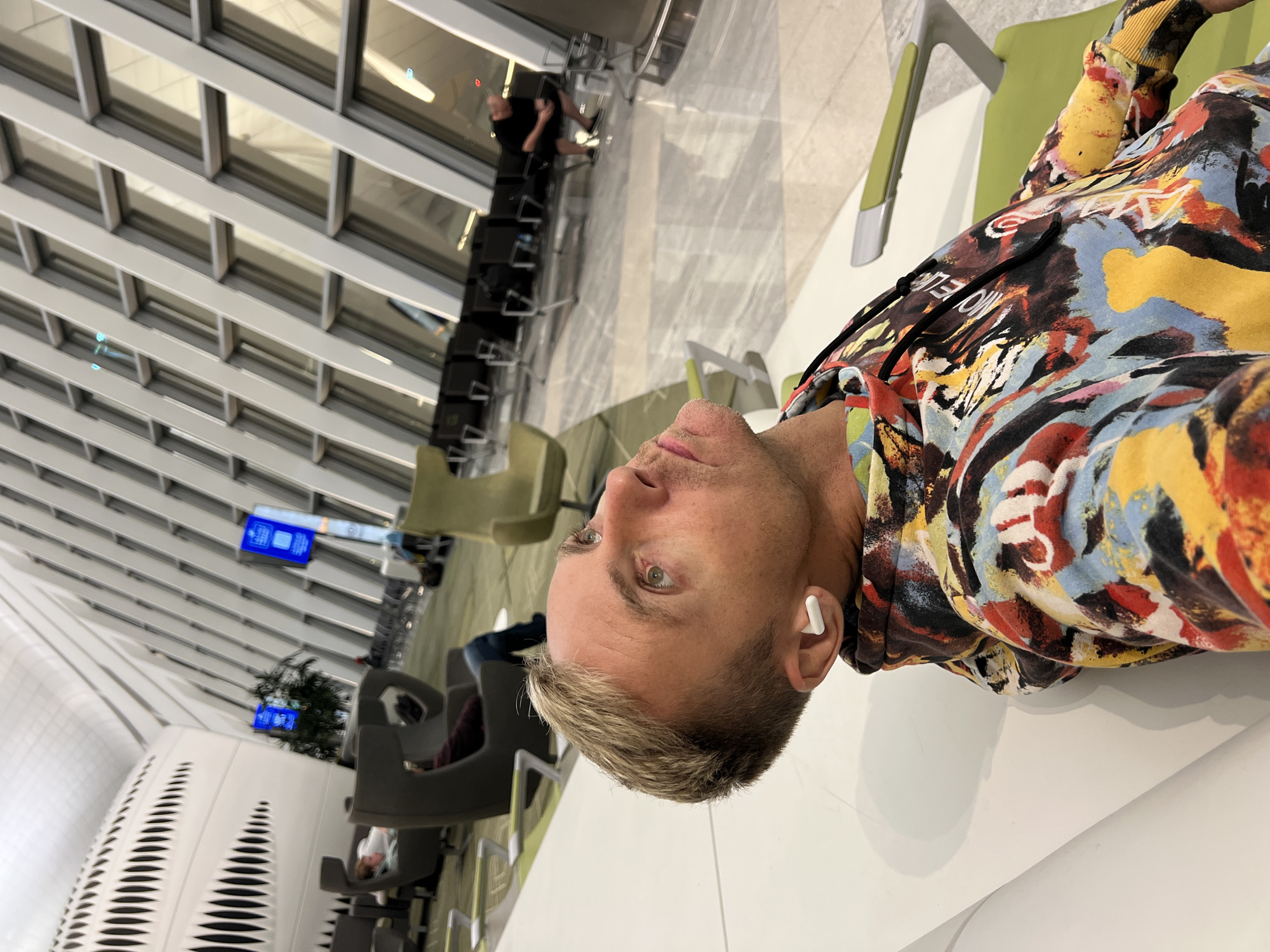 Passing time in Abu Dhabi airport terminal, July 2026