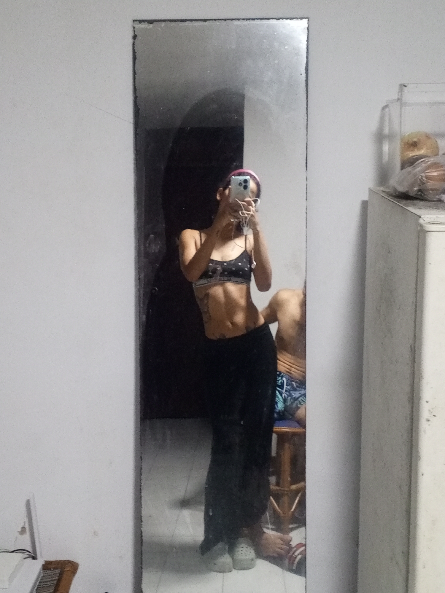 Mirror selfies in Porlamar, casual athletic look with butterfly tattoo