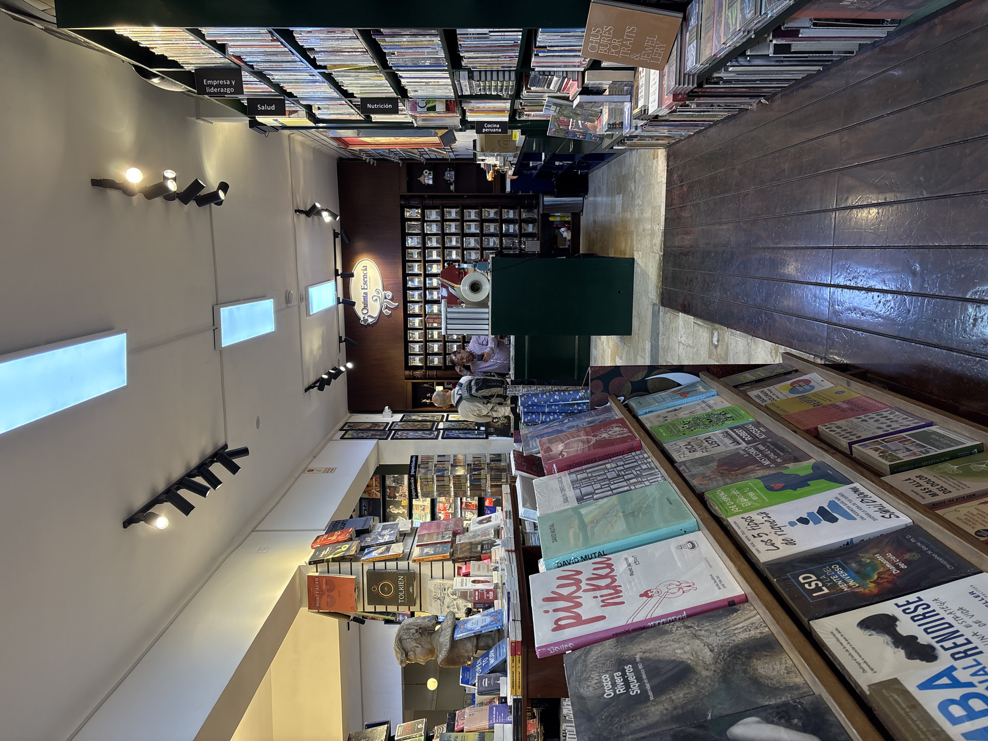 Inside a San Isidro bookstore with a striking metal sculpture