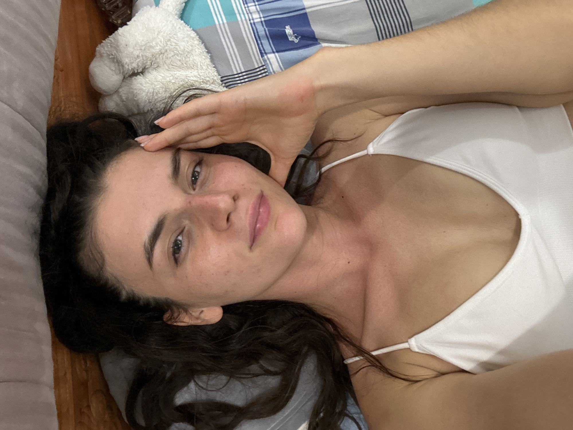 Woman photographed with cat in bedroom in Mũi Né