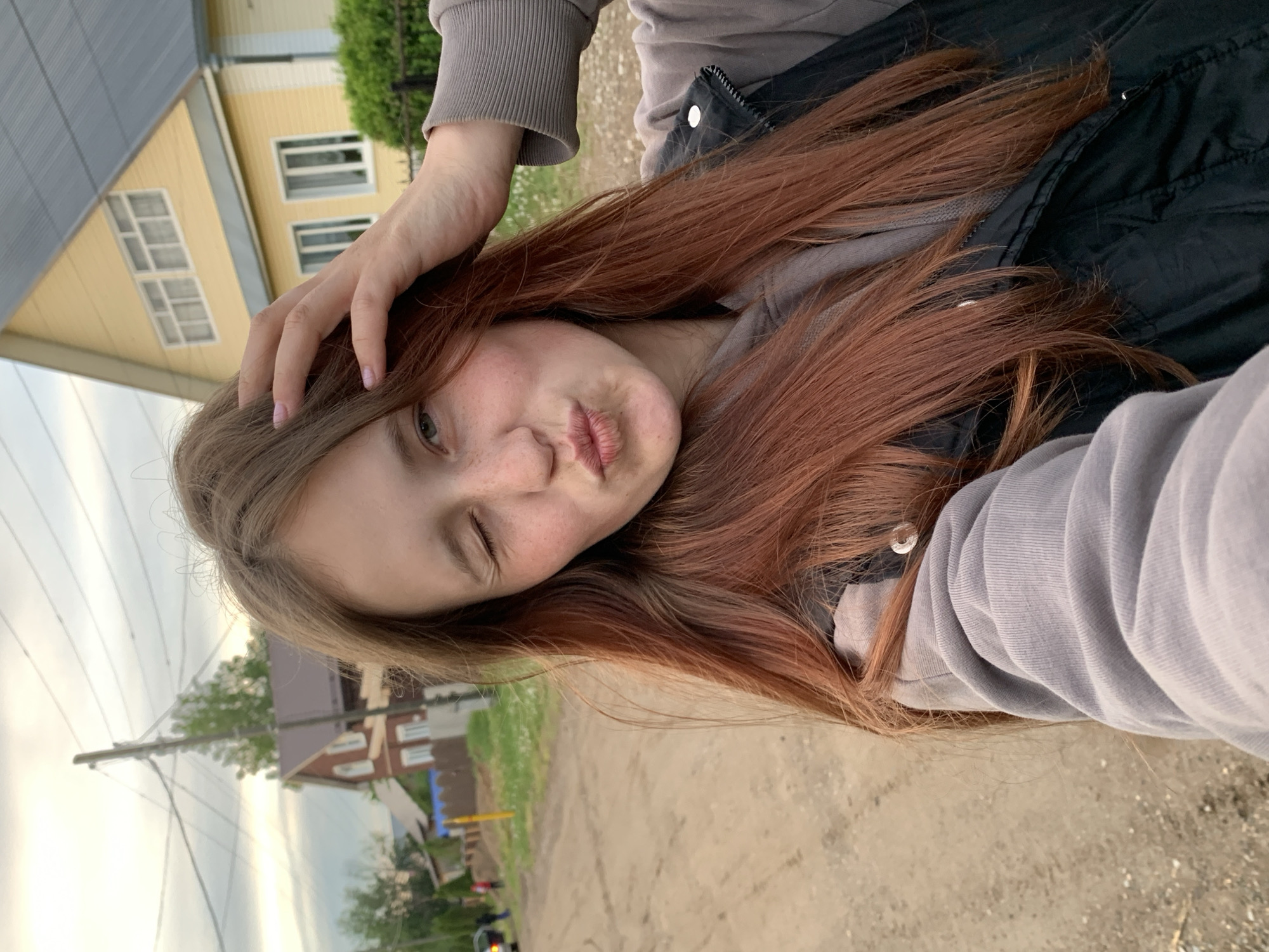 Woman documents afternoon with selfies across Russian village
