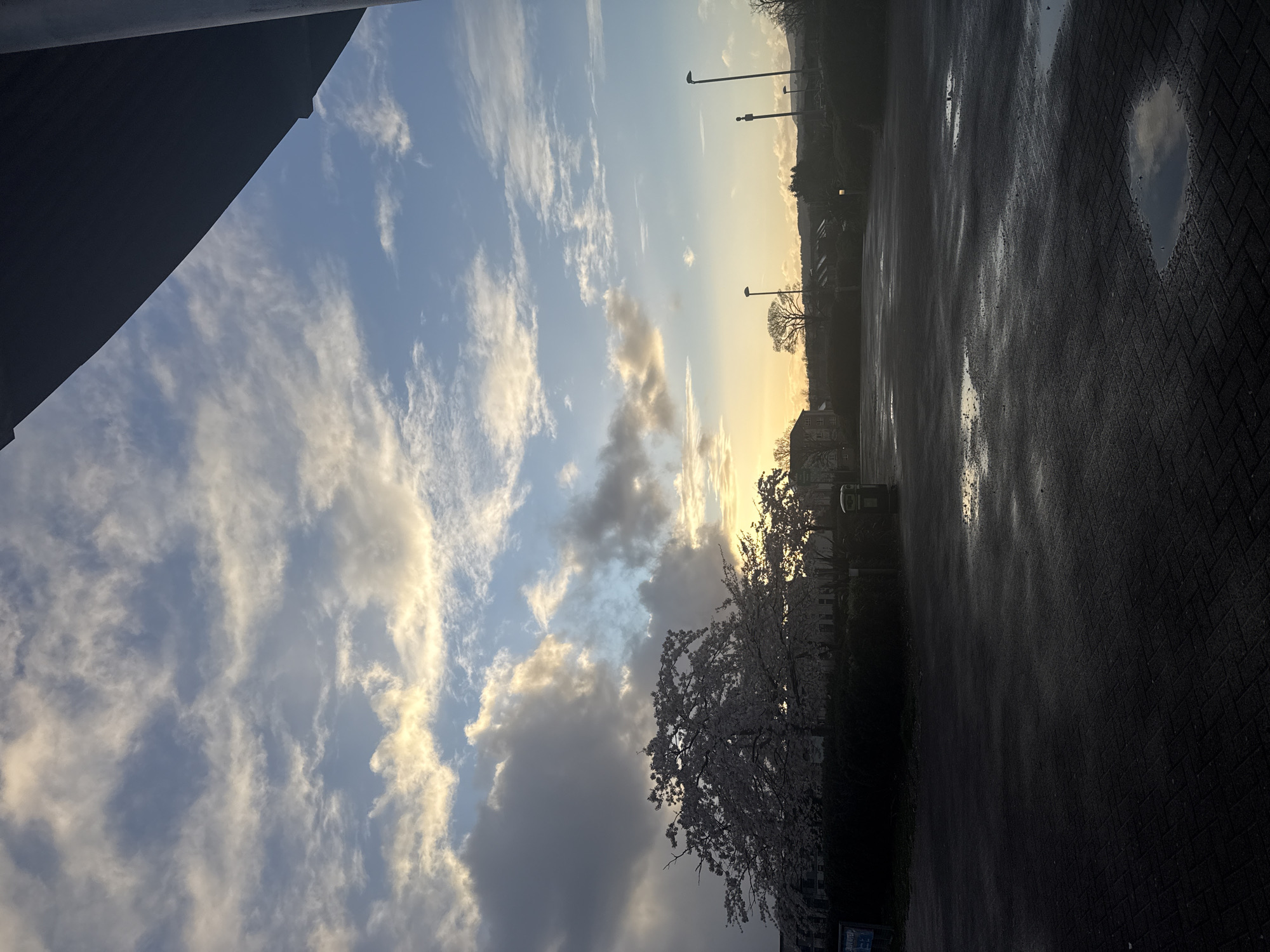 Urban scene with dramatic cloudy sky documented