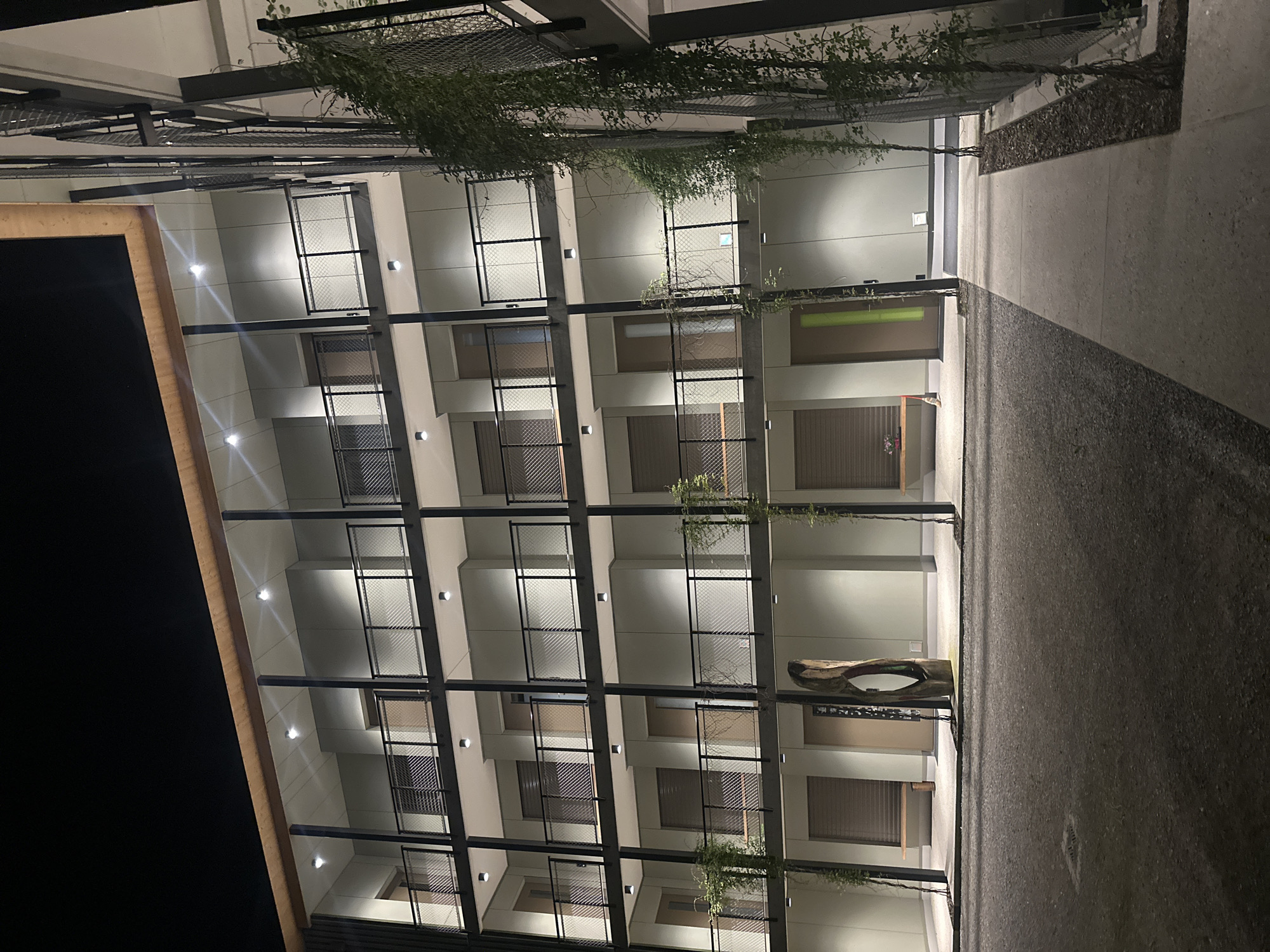 Nighttime view of apartment building in Fehraltorf, Switzerland