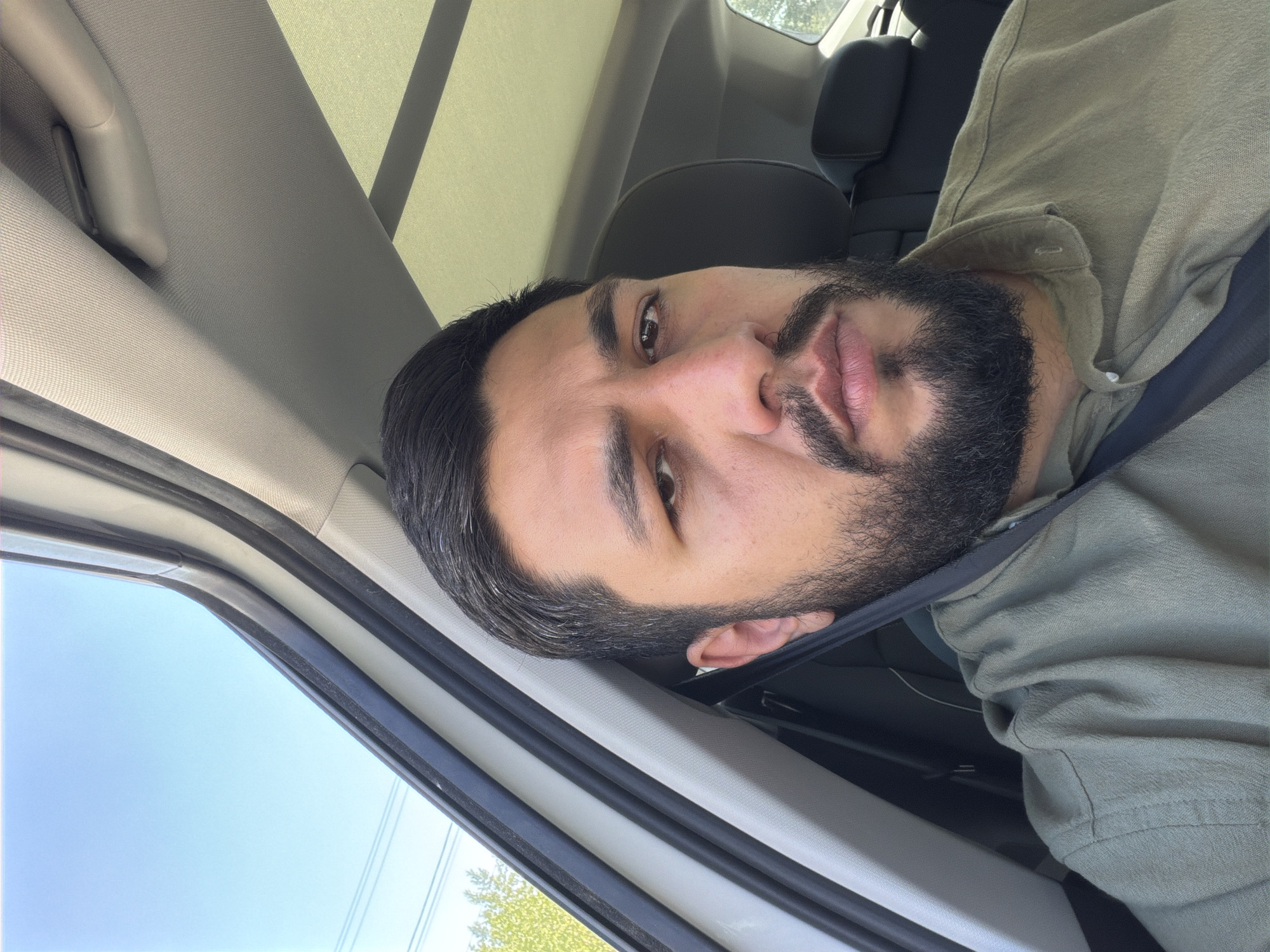 Man photographed in vehicle interior in Krasnoyarsk, Russia