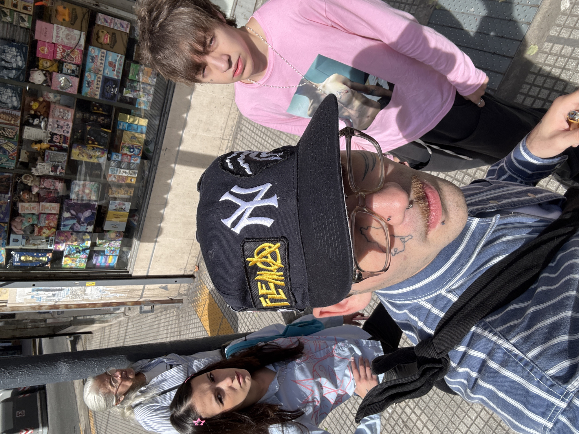 Group poses for photo on Buenos Aires shopping street