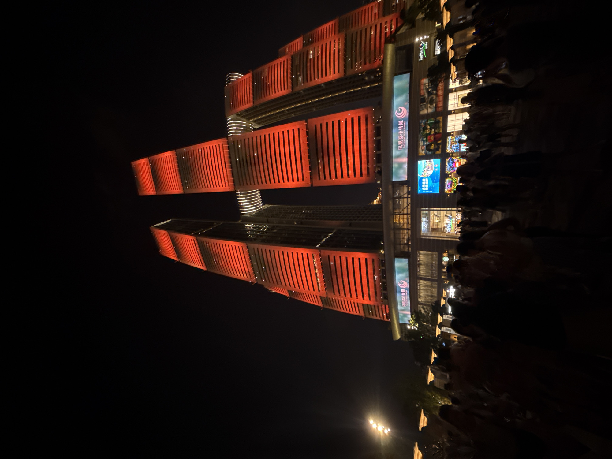 Raffles City Chongqing glows at night in Yuzhong District