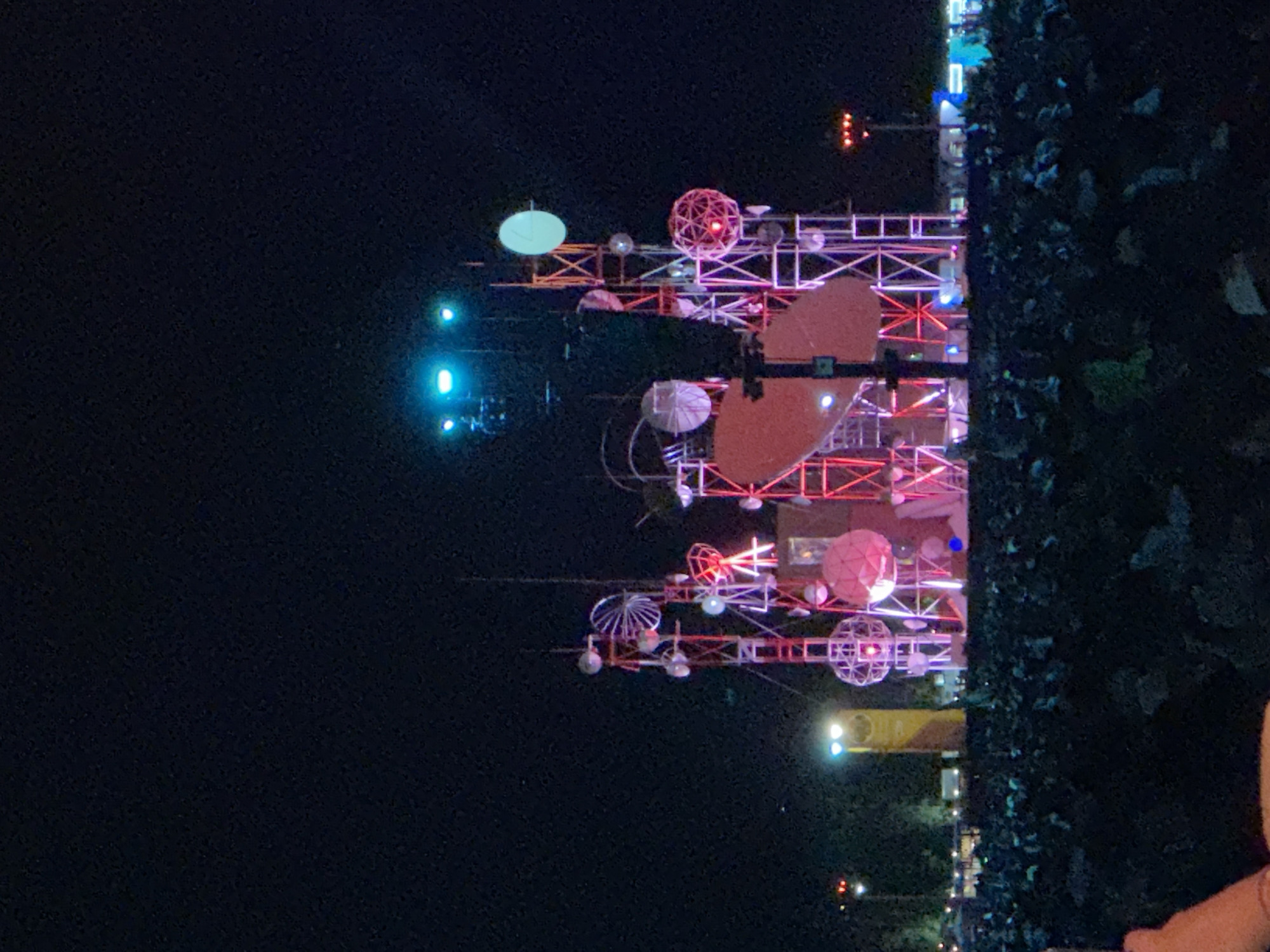 Illuminated temporary structure observed at night in Indio, California