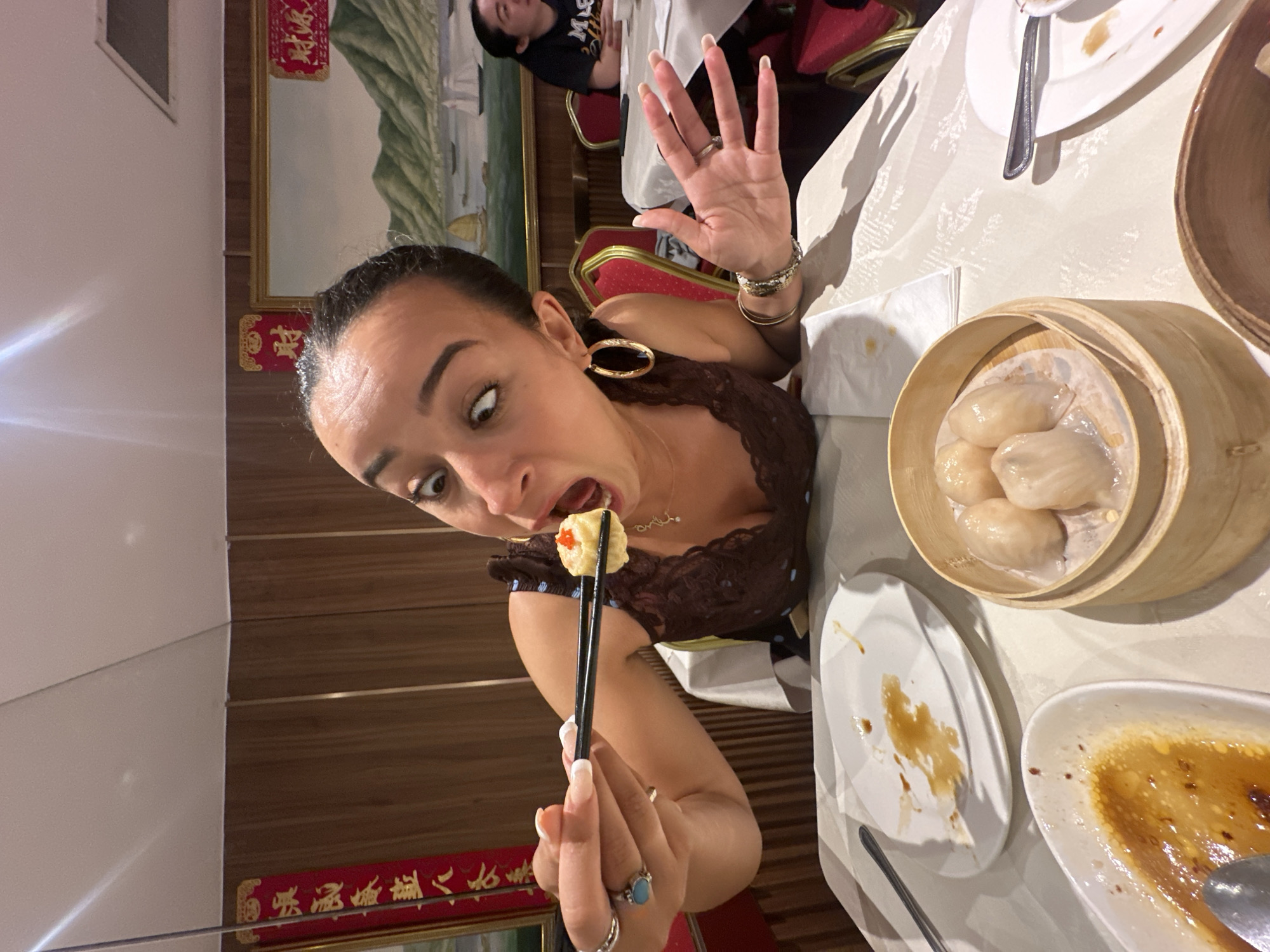 Diners enjoy dumplings at London Chinese restaurant