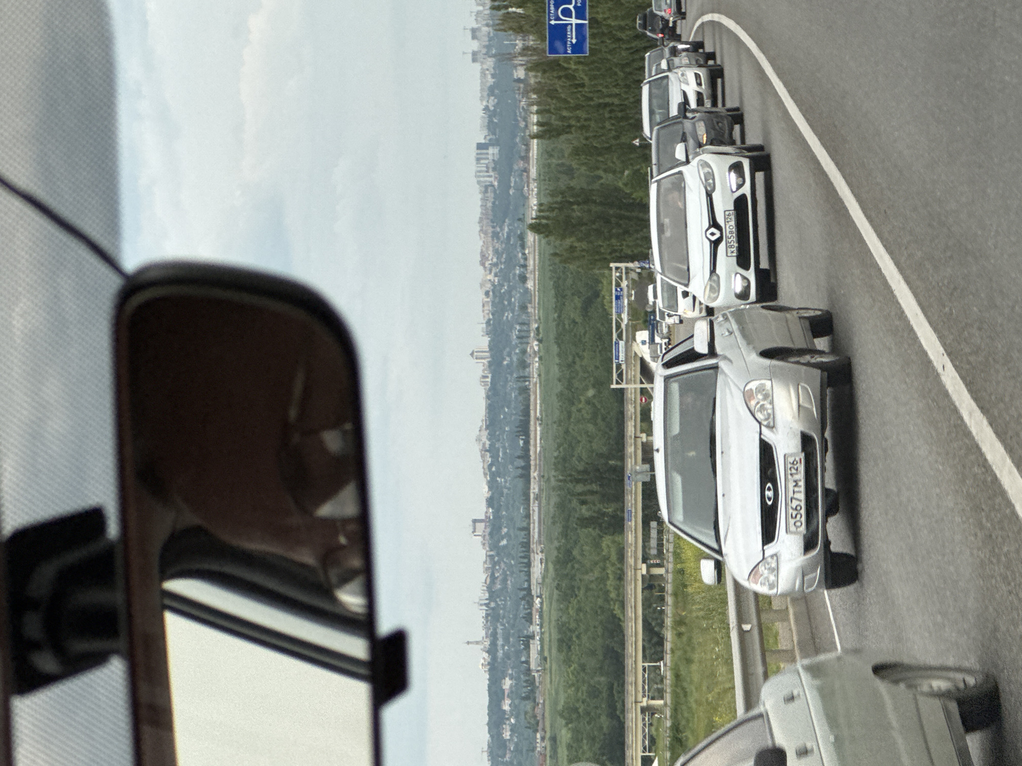 Highway traffic jam outside Mikhaylovsk amid open farmland