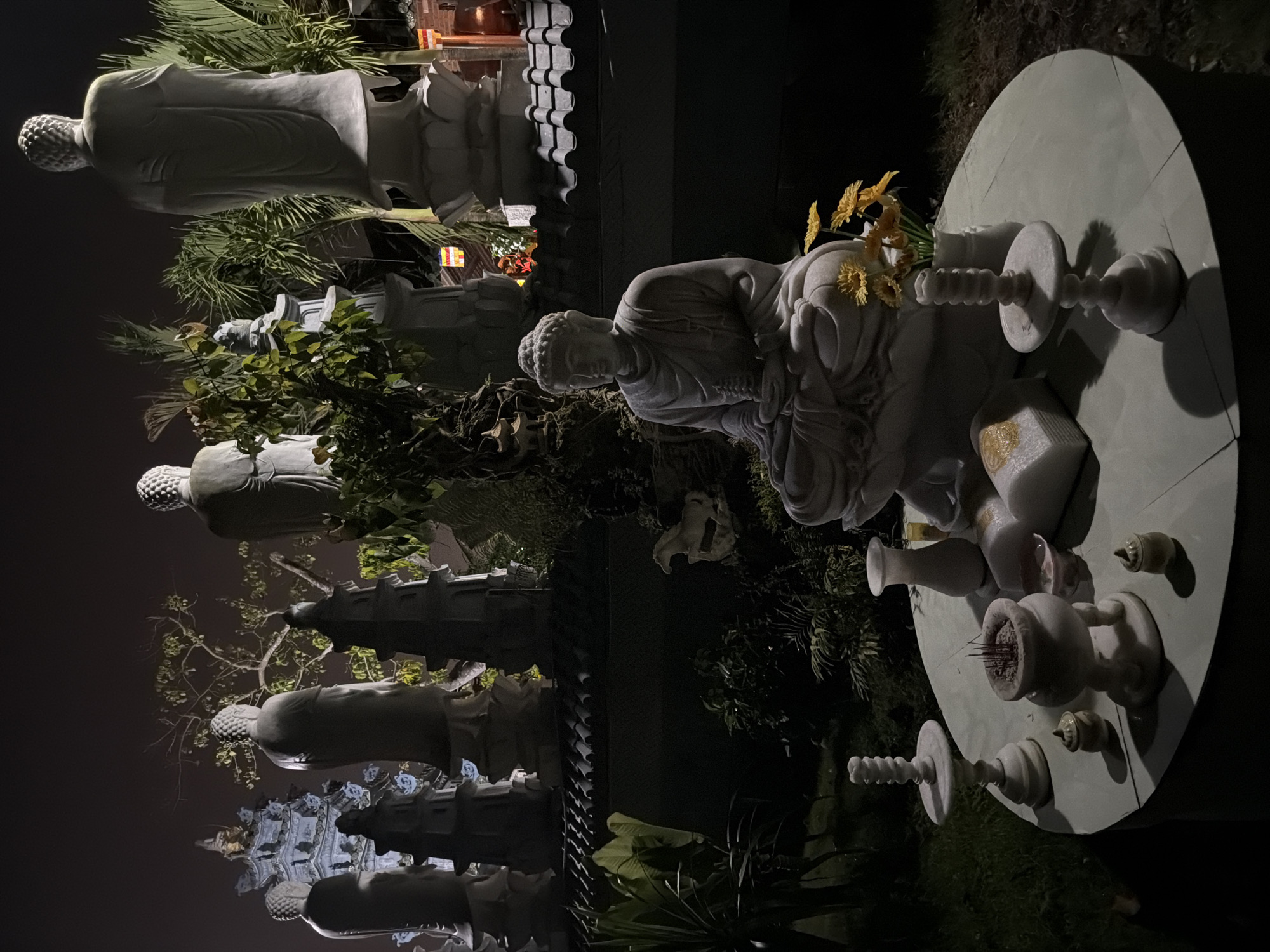 Nighttime Buddhist temple ritual setup observed in Đà Nẵng