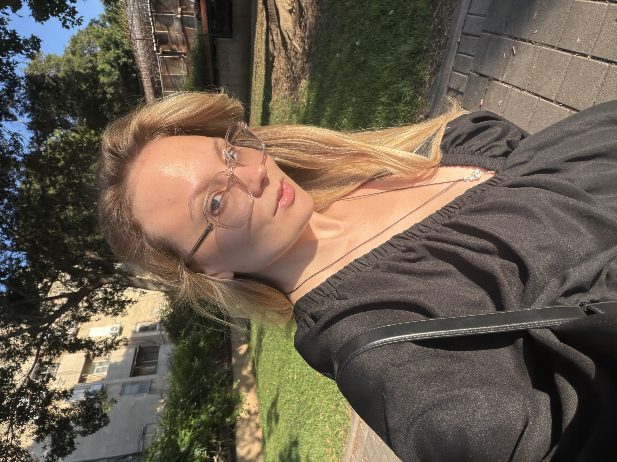 Woman takes rotated selfie in Bat Yam, Israel