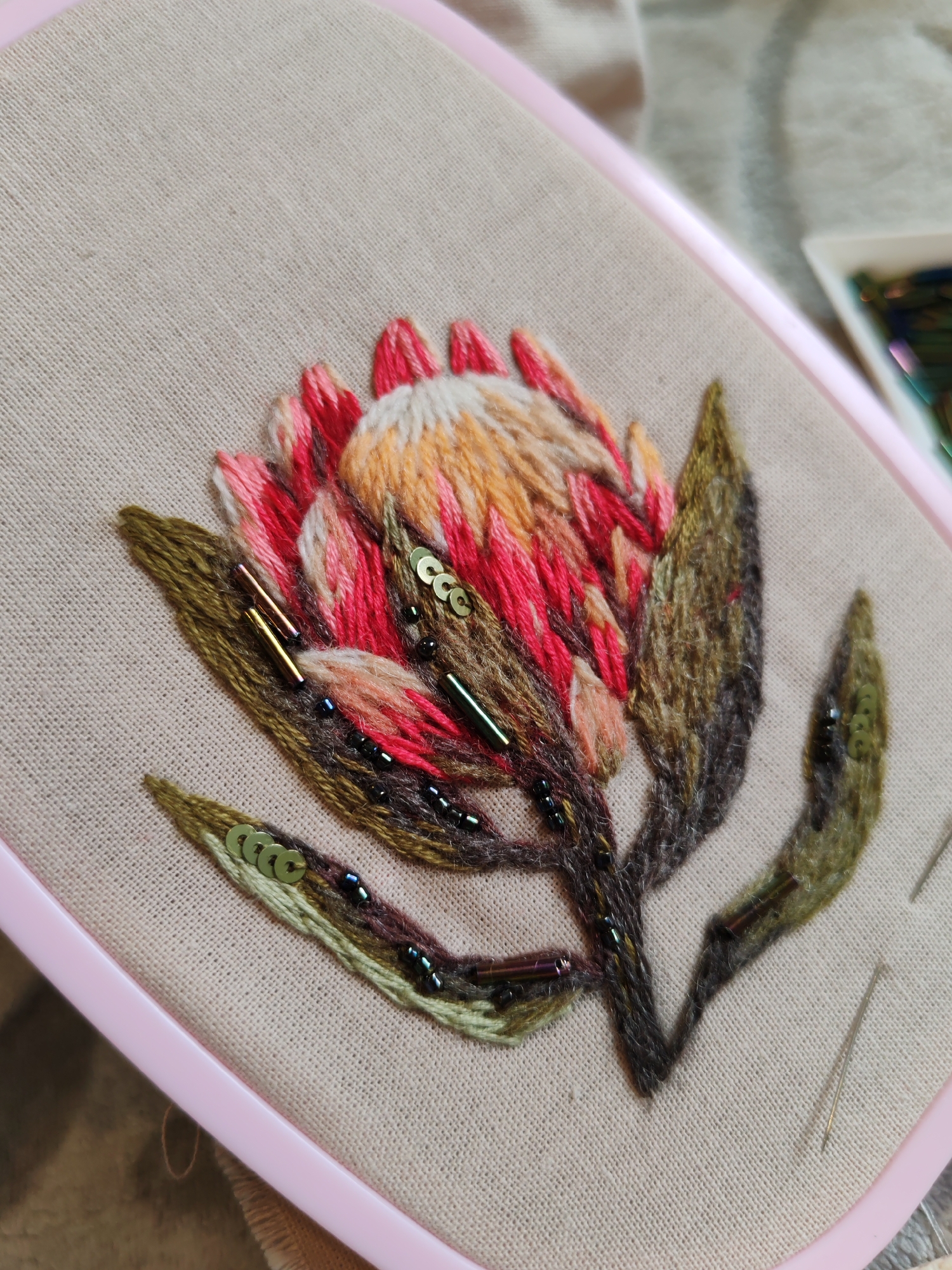 Morning domestic scenes captured in Ust-Ilimsk: sleeping cat, embroidery work