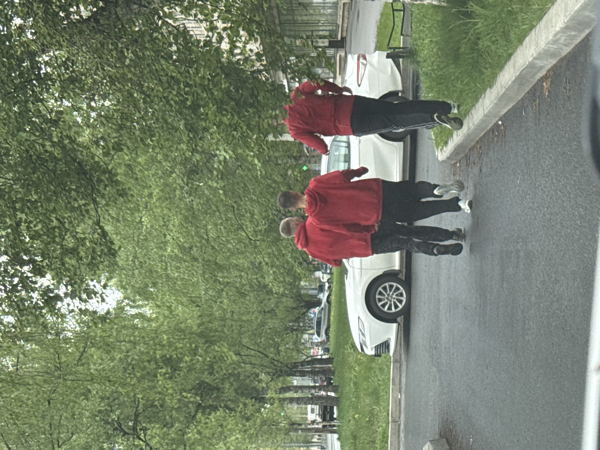 Red-hooded group observed walking, running on St. Petersburg street