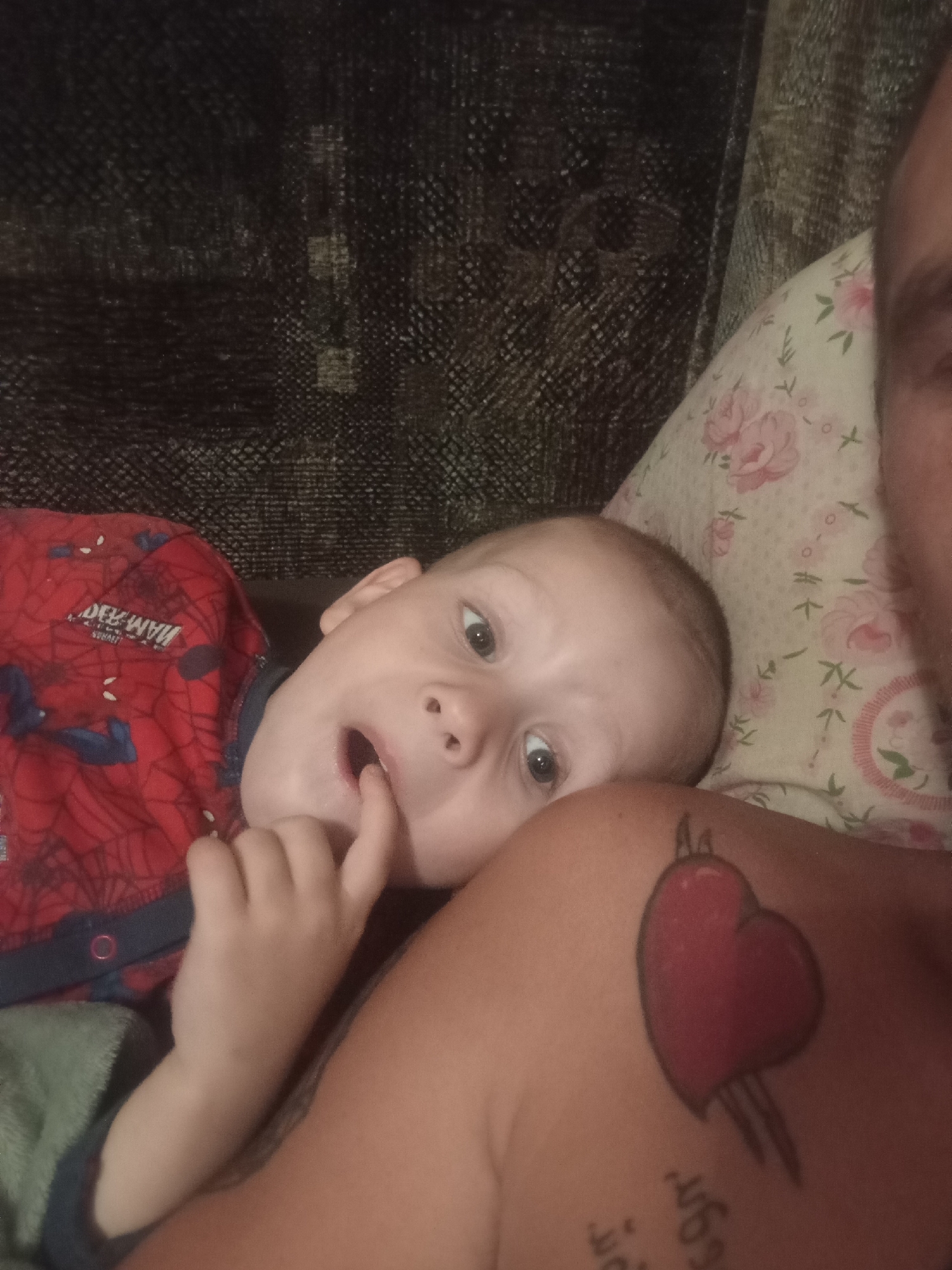 Quiet indoor afternoon with a baby, a toddler, and a tattoo