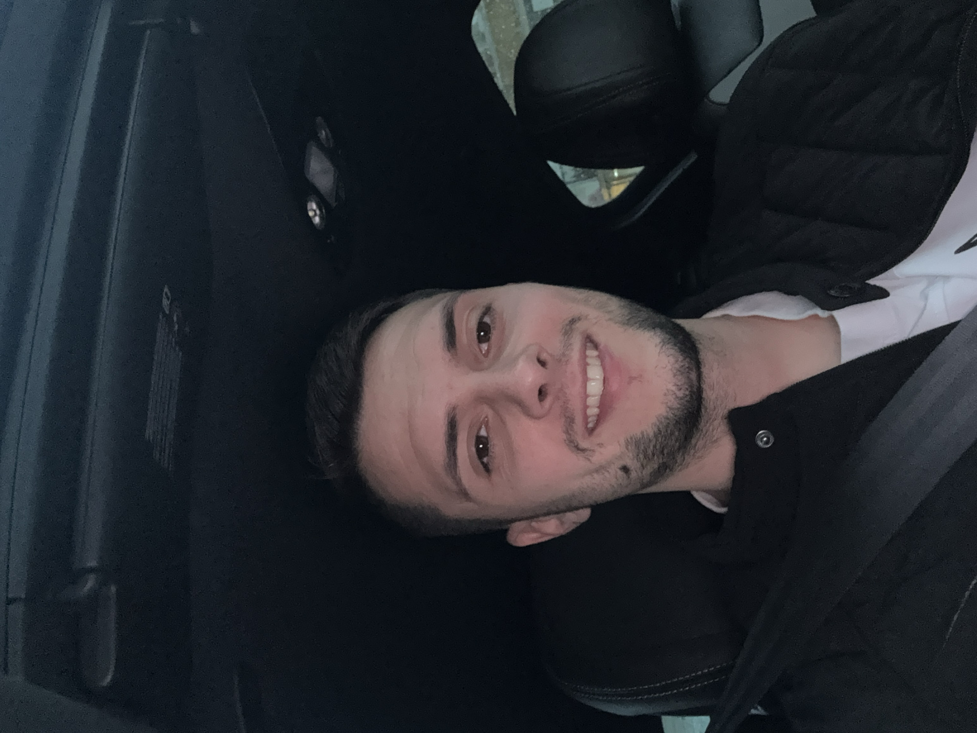 Man photographed smiling in driver's seat in Bulgaria