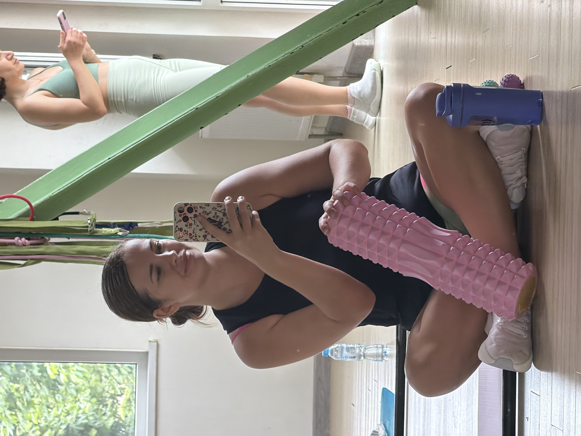 Post-workout selfie with a foam roller in a Sochi gym