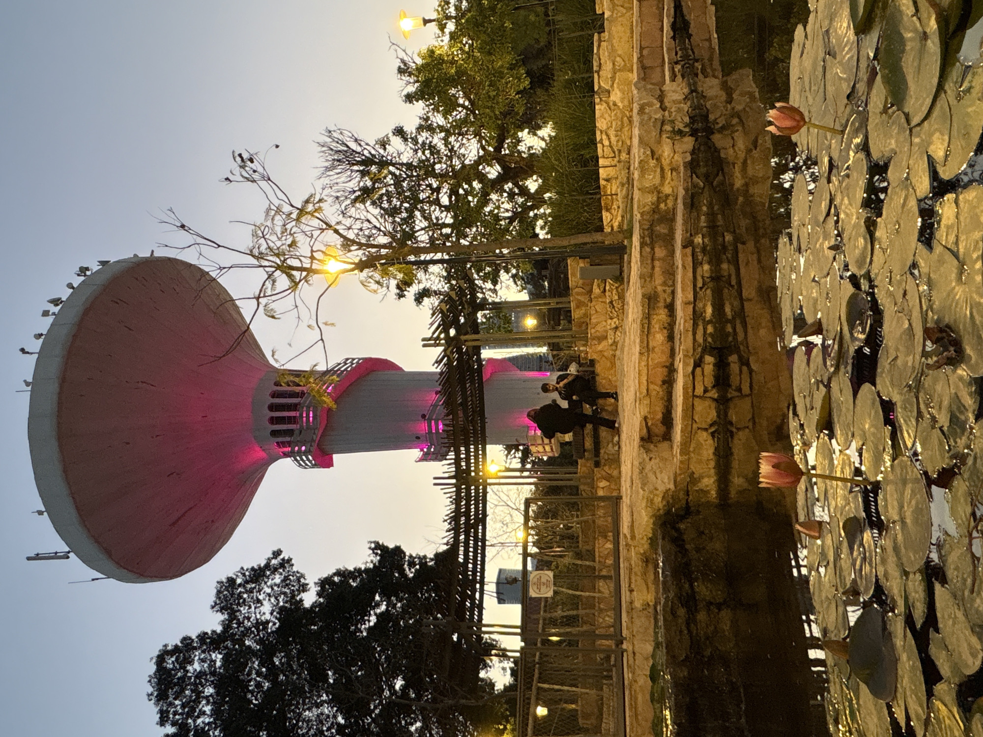 Ramat Gan water tower glows pink in evening display