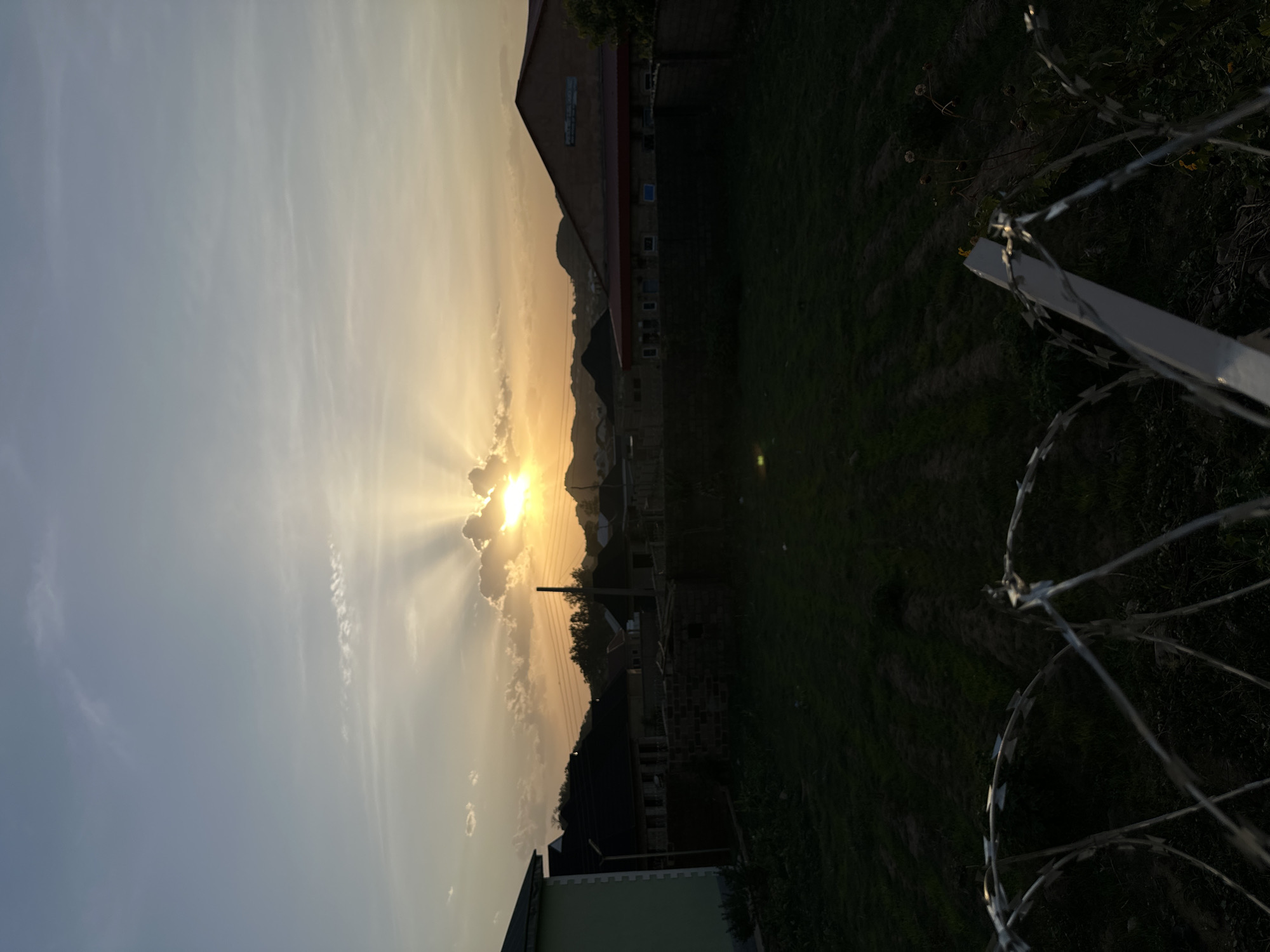 Partial solar eclipse observed through clouds over Bukuru, Nigeria
