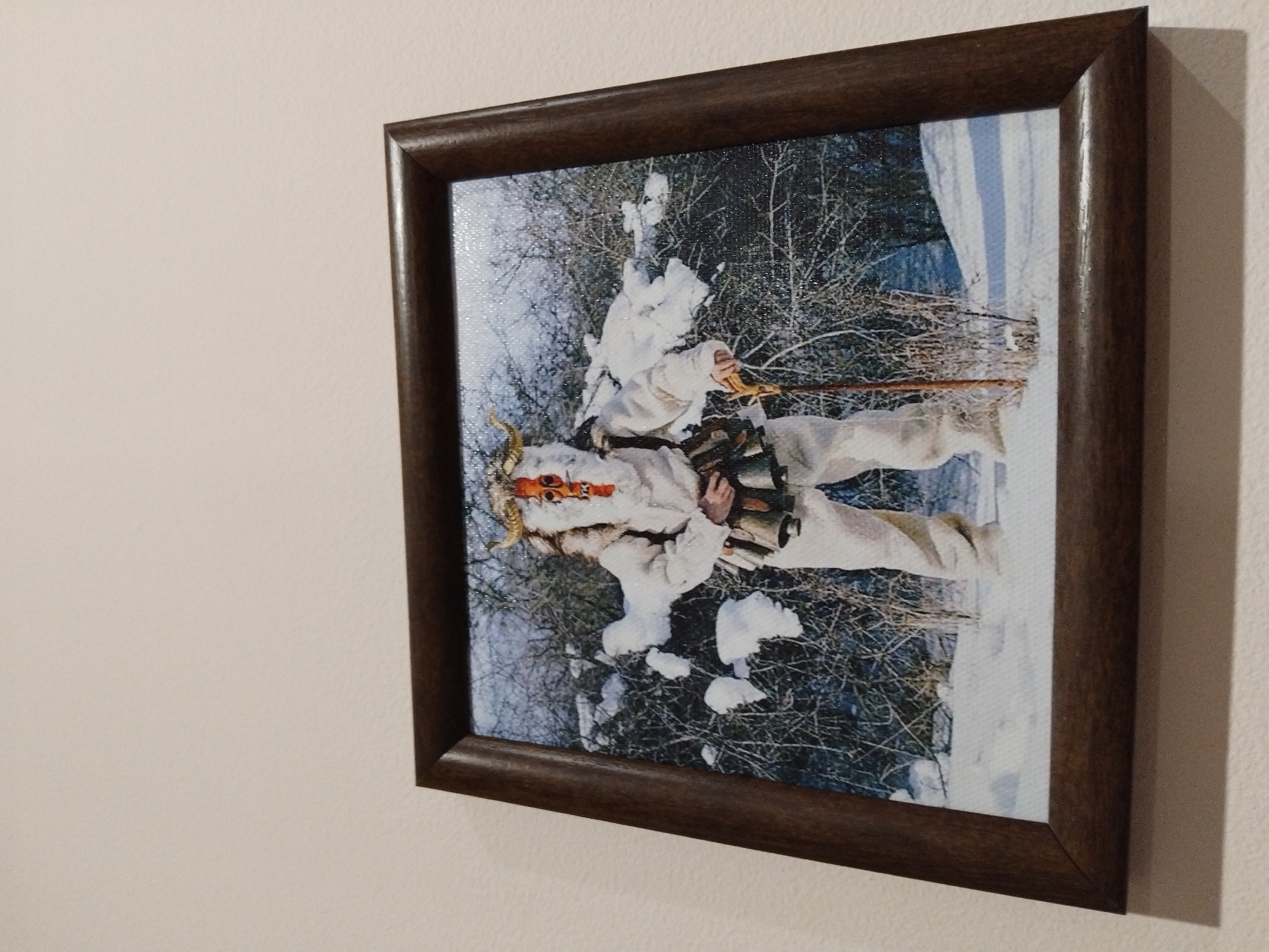 Traditional winter scene artwork displayed in Nova Zagora home