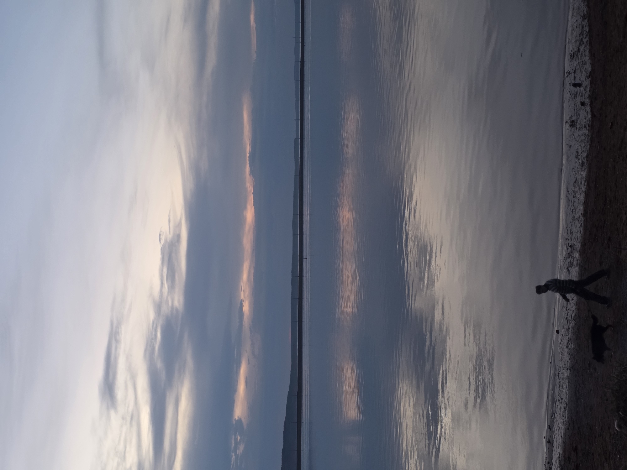 Evening waterfront moments captured in Chaikovsky, Russia