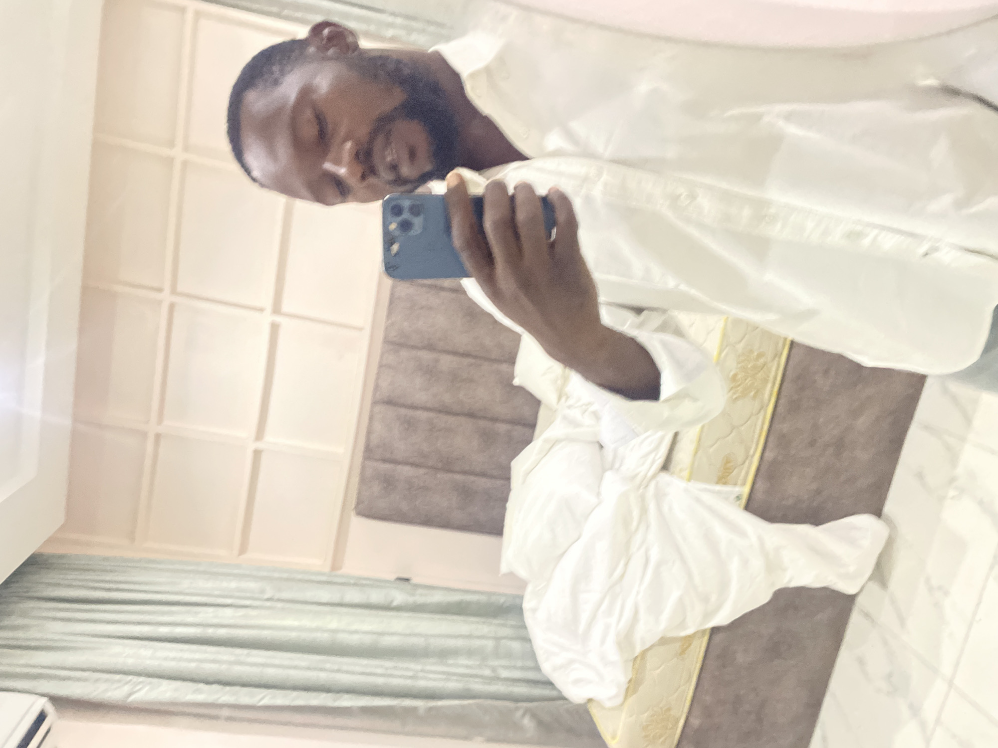 Selfie session and neighborhood snapshots from Abuja, midday