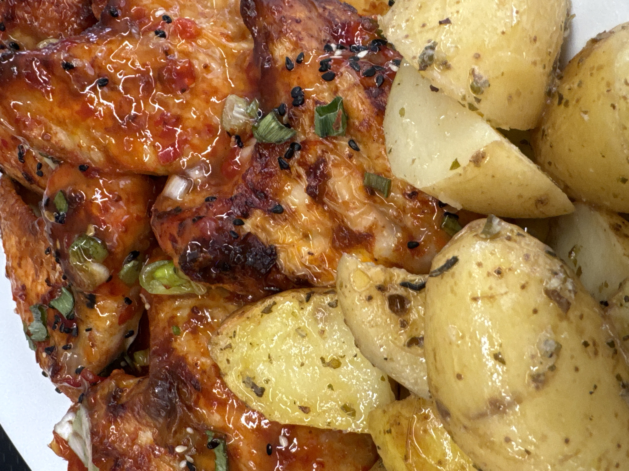 Glazed chicken wings and roasted potatoes, Athens
