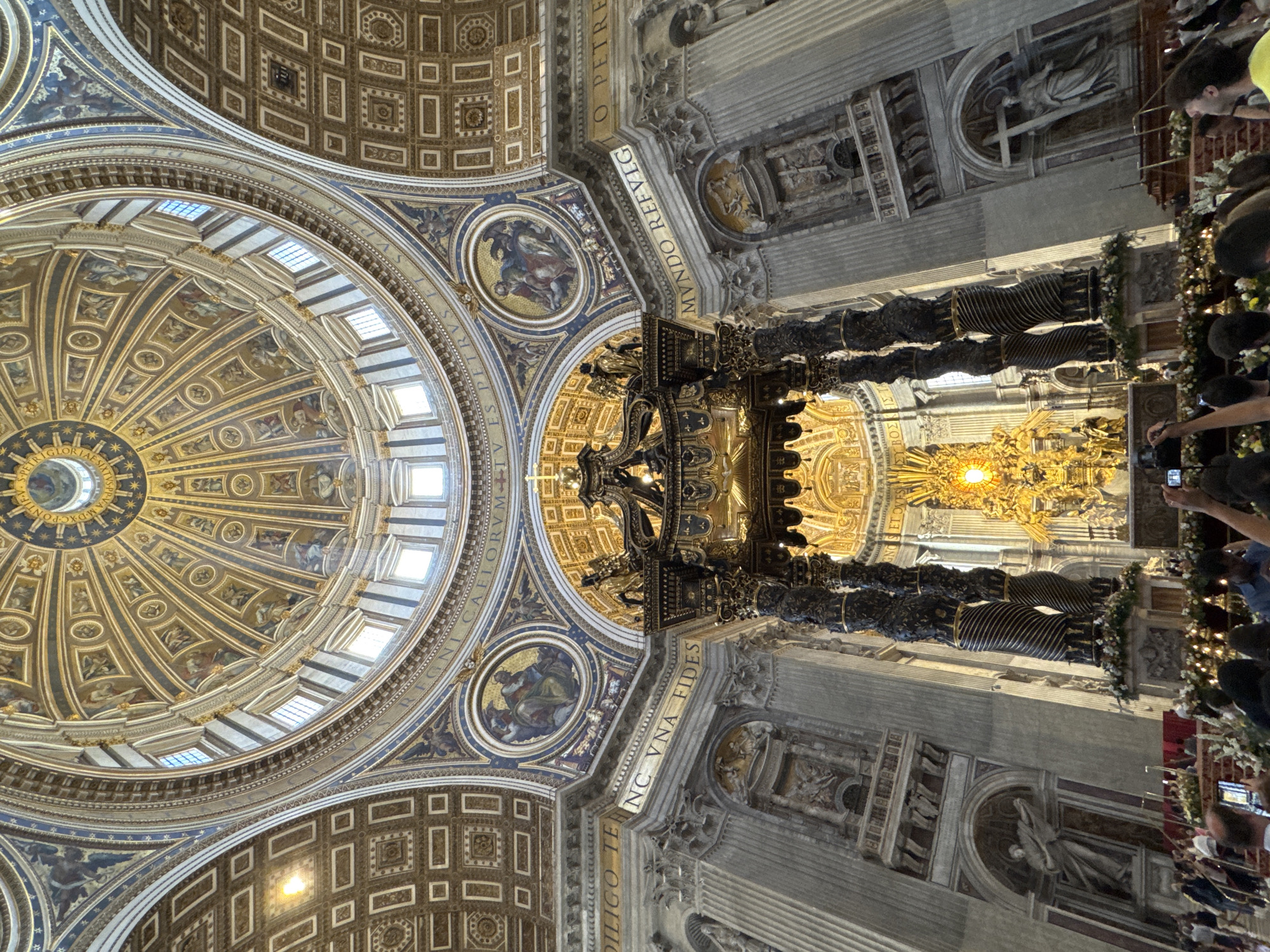 Visitor captures upward view of St. Peter's Basilica interior
