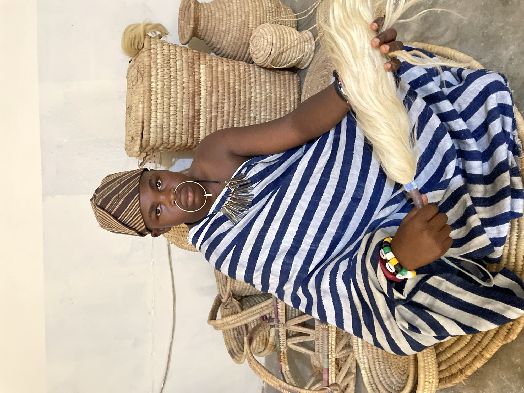 Traditional attire photoshoot captured in Jos craft market setting
