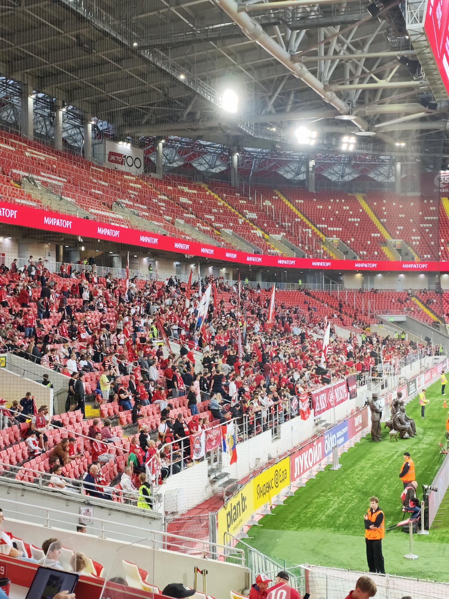 Packed stadium and team transport logistics at a soccer event