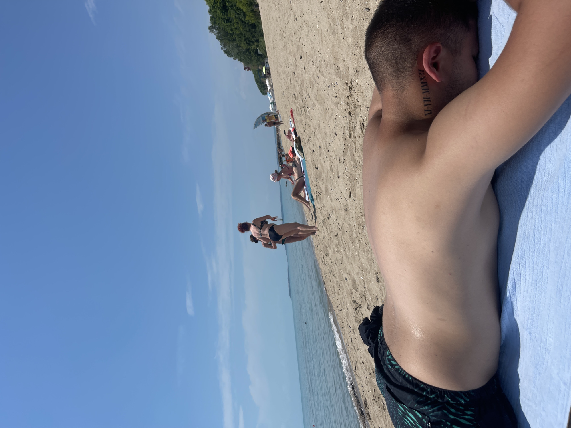 Sunny morning beach activities documented in Sveti Vlas, Bulgaria