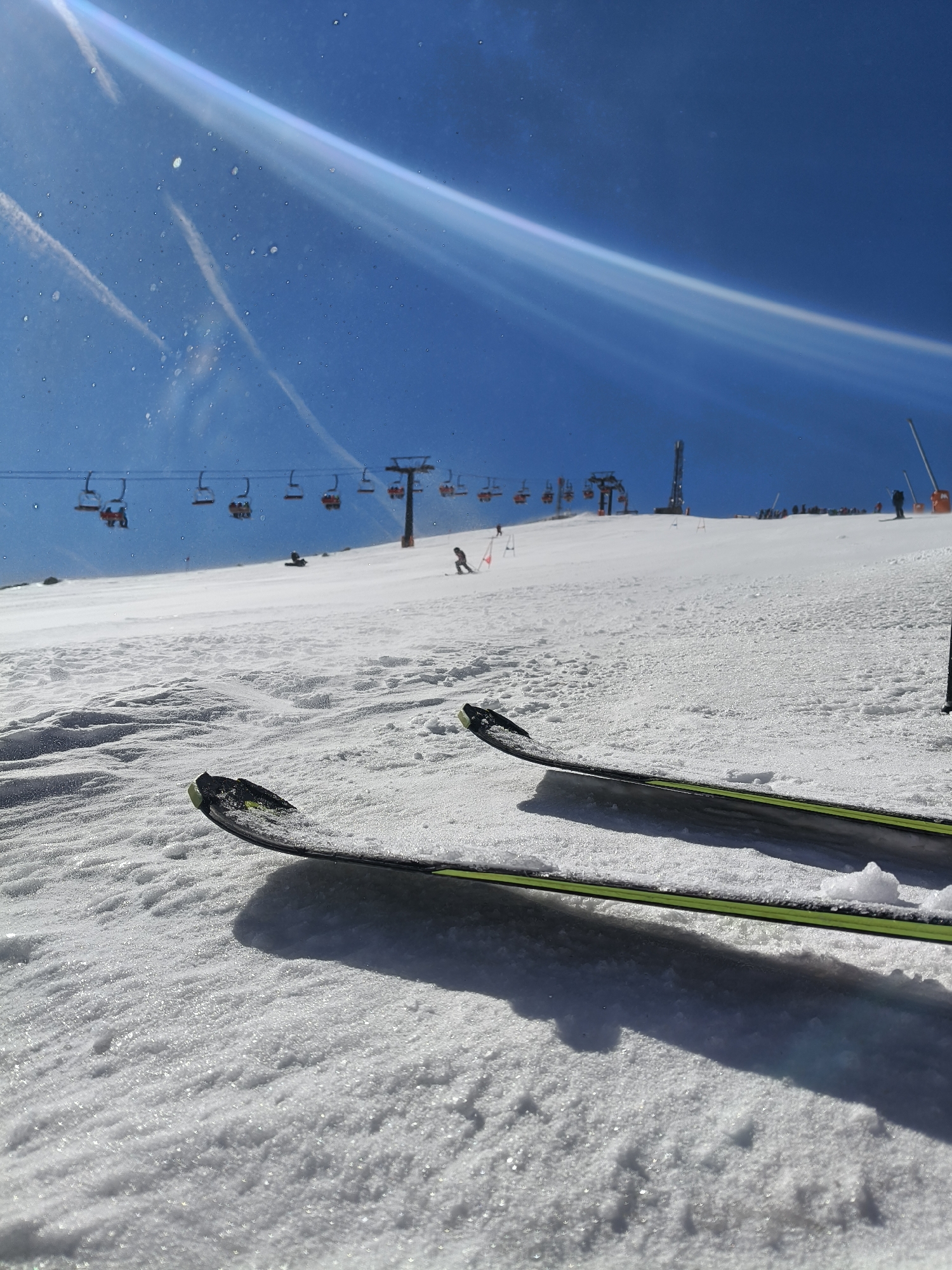 Skis photographed on sunny slopes at Pyrenees resort