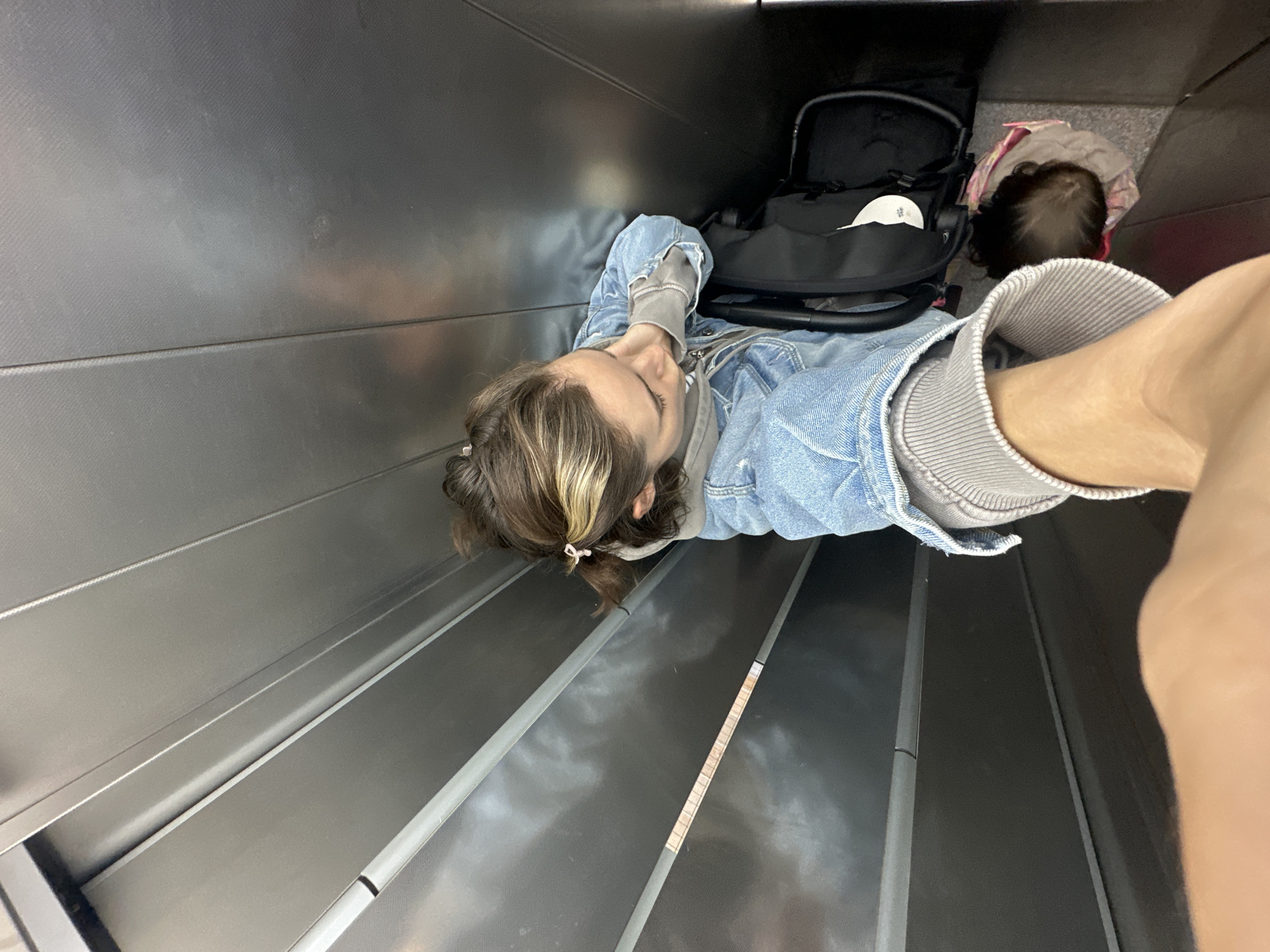Elevator selfie session with child in Kiel