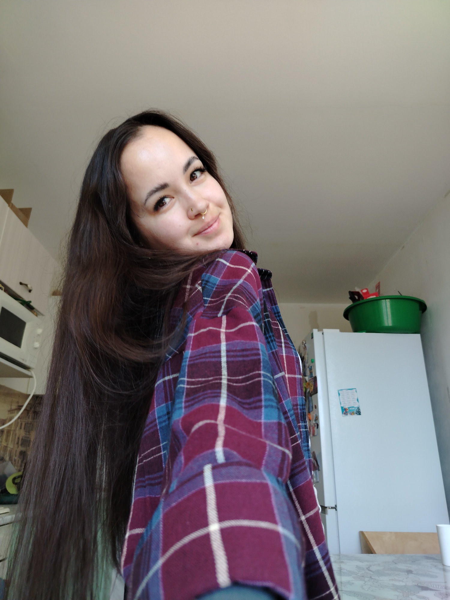 Woman photographed in casual morning scenes around Noviy, Russia
