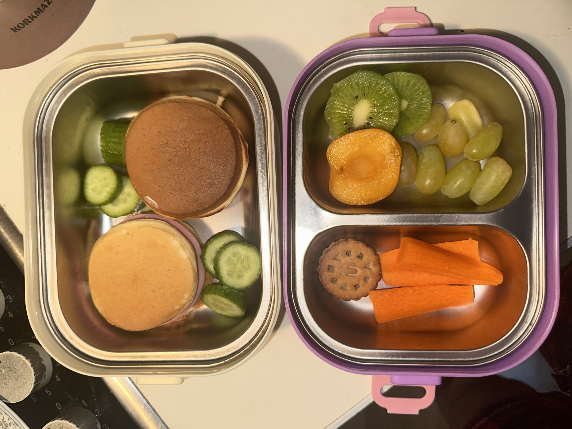 Two prepared lunchboxes spotted on kitchen counter in Esenyurt