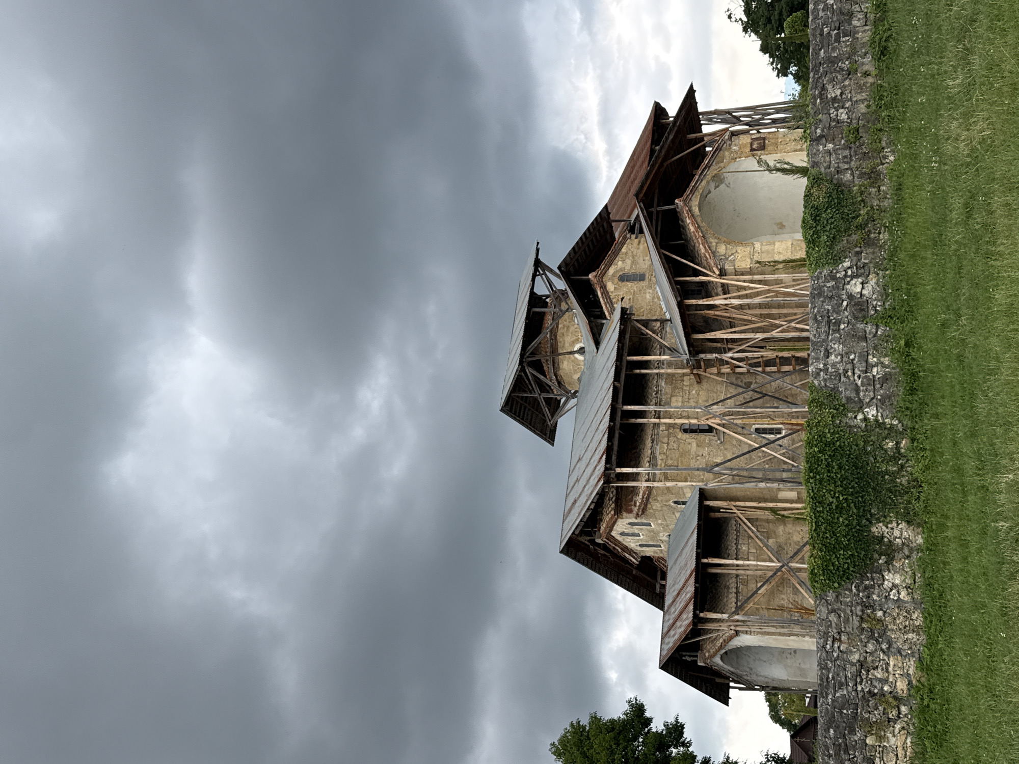 Ancient stone monastery in Gudauta, caught between ruin and restoration