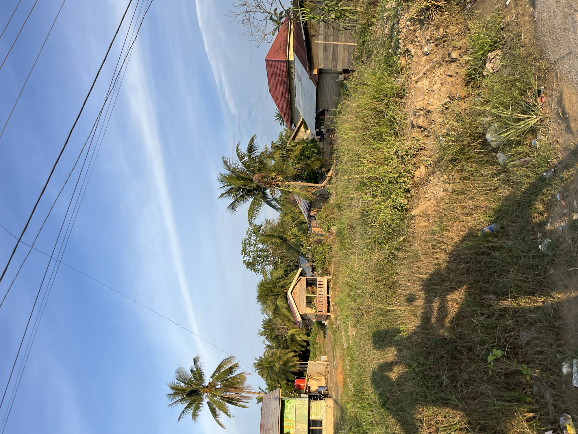 Rural Indonesian villages show daily life and structural damage