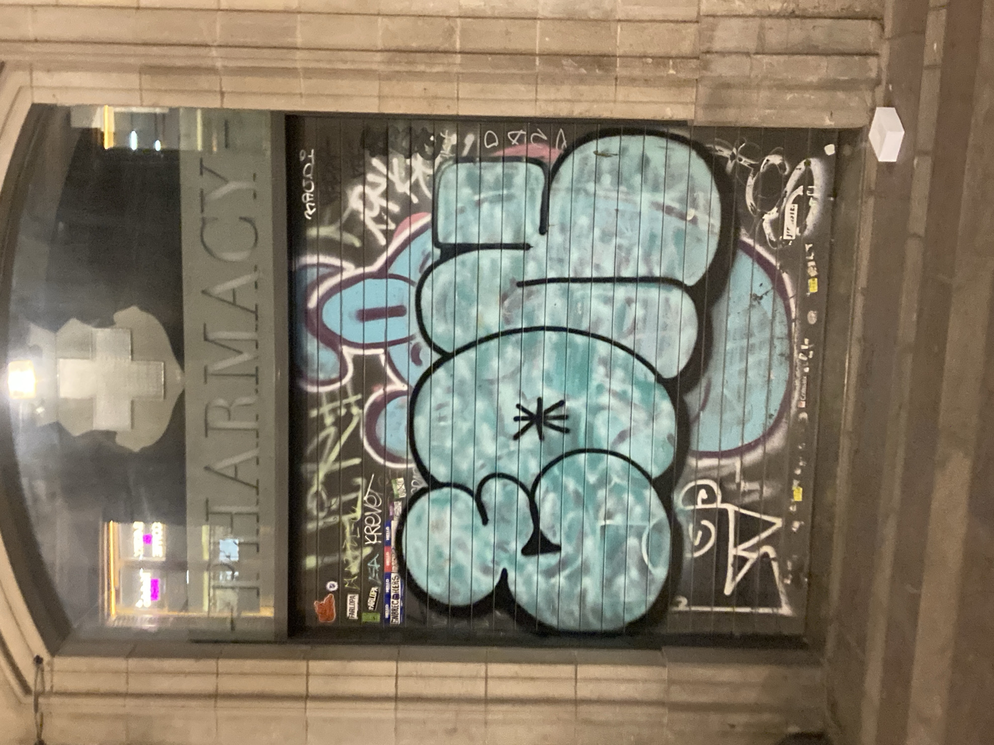 Barcelona alleyways after dark, wall-to-wall street art