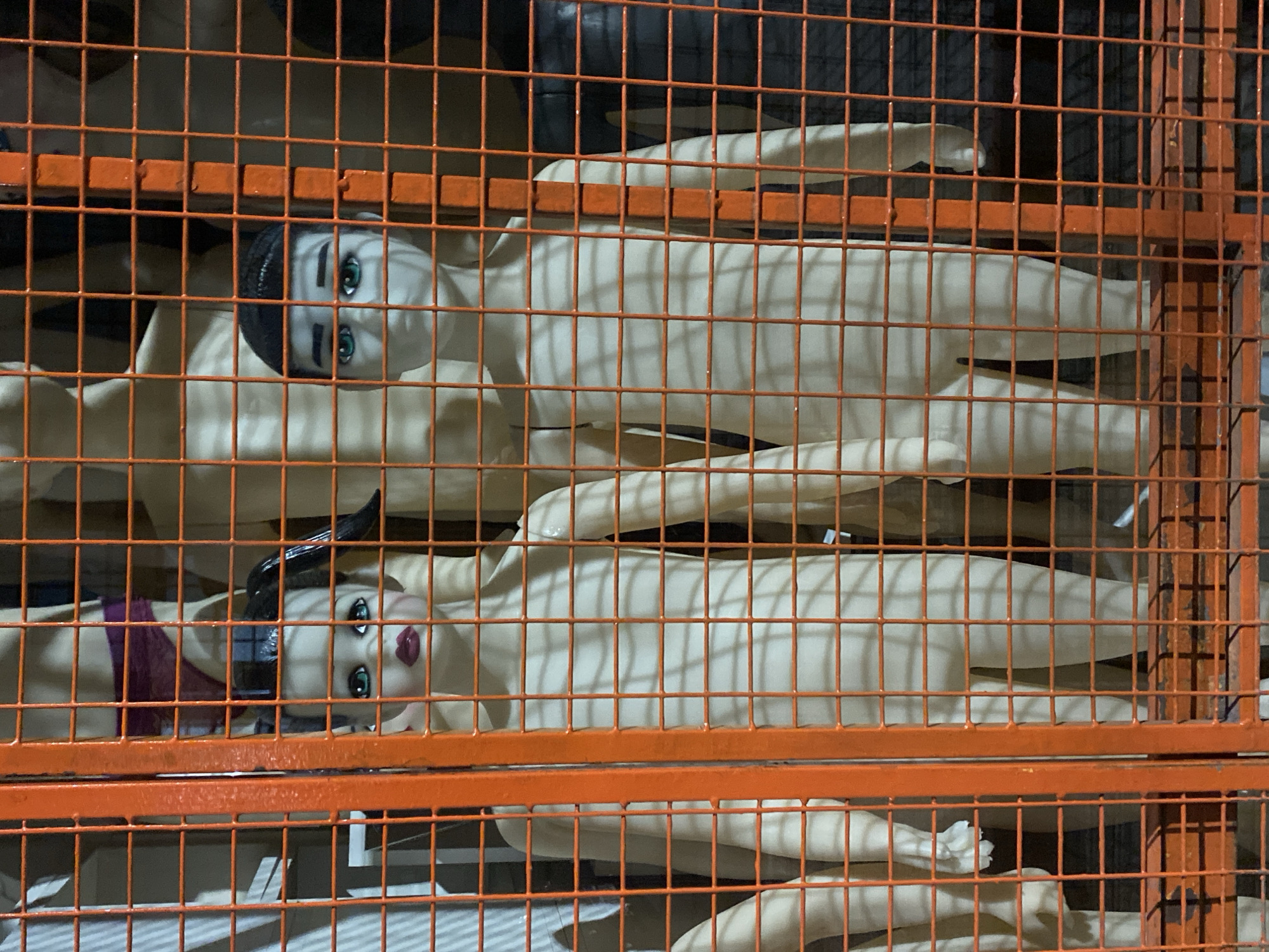 Morning street scenes captured in Buenos Aires include mannequins, commuter